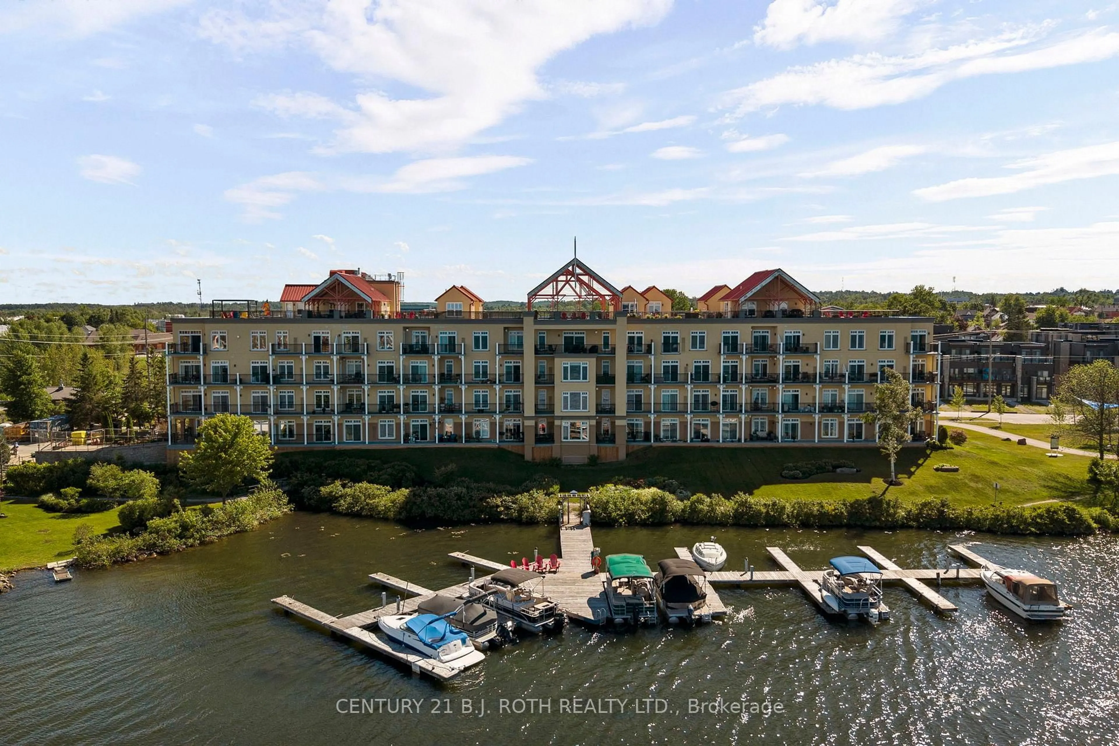 A pic from outside/outdoor area/front of a property/back of a property/a pic from drone, water/lake/river/ocean view for 140 Cedar Island Rd #313, Orillia Ontario L3V 1T1