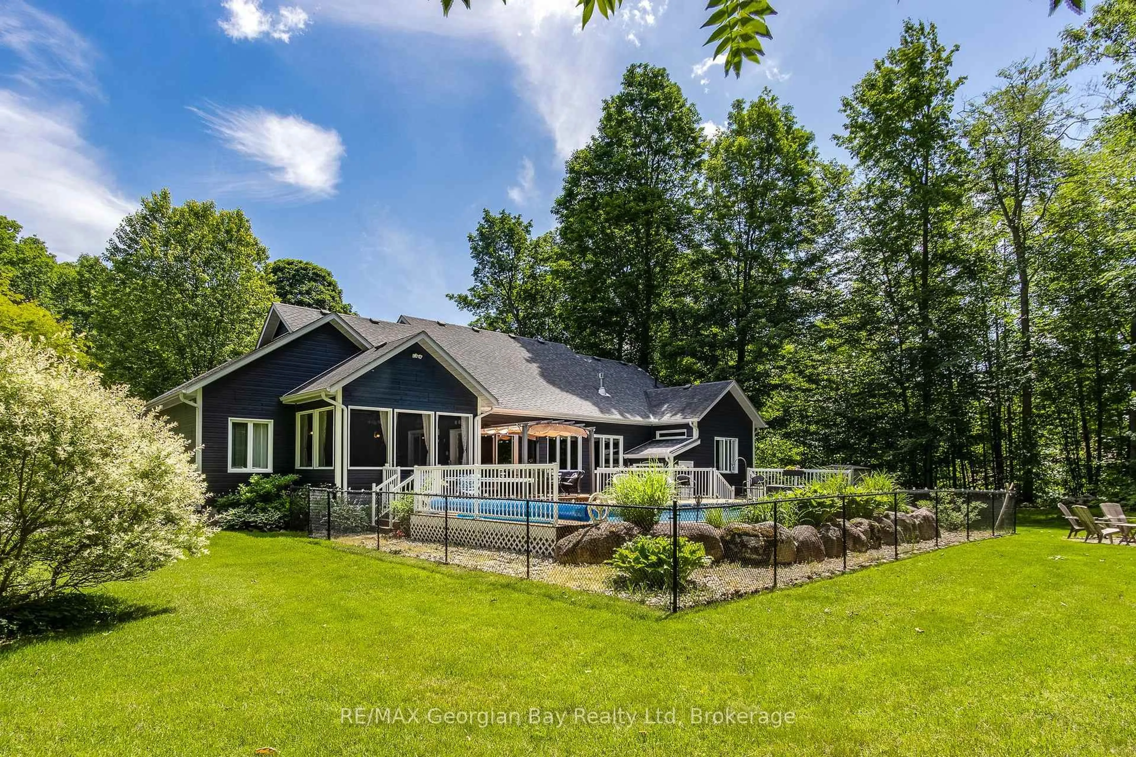 A pic from outside/outdoor area/front of a property/back of a property/a pic from drone, water/lake/river/ocean view for 390 Puddicombe Rd, Midland Ontario L4R 5G7