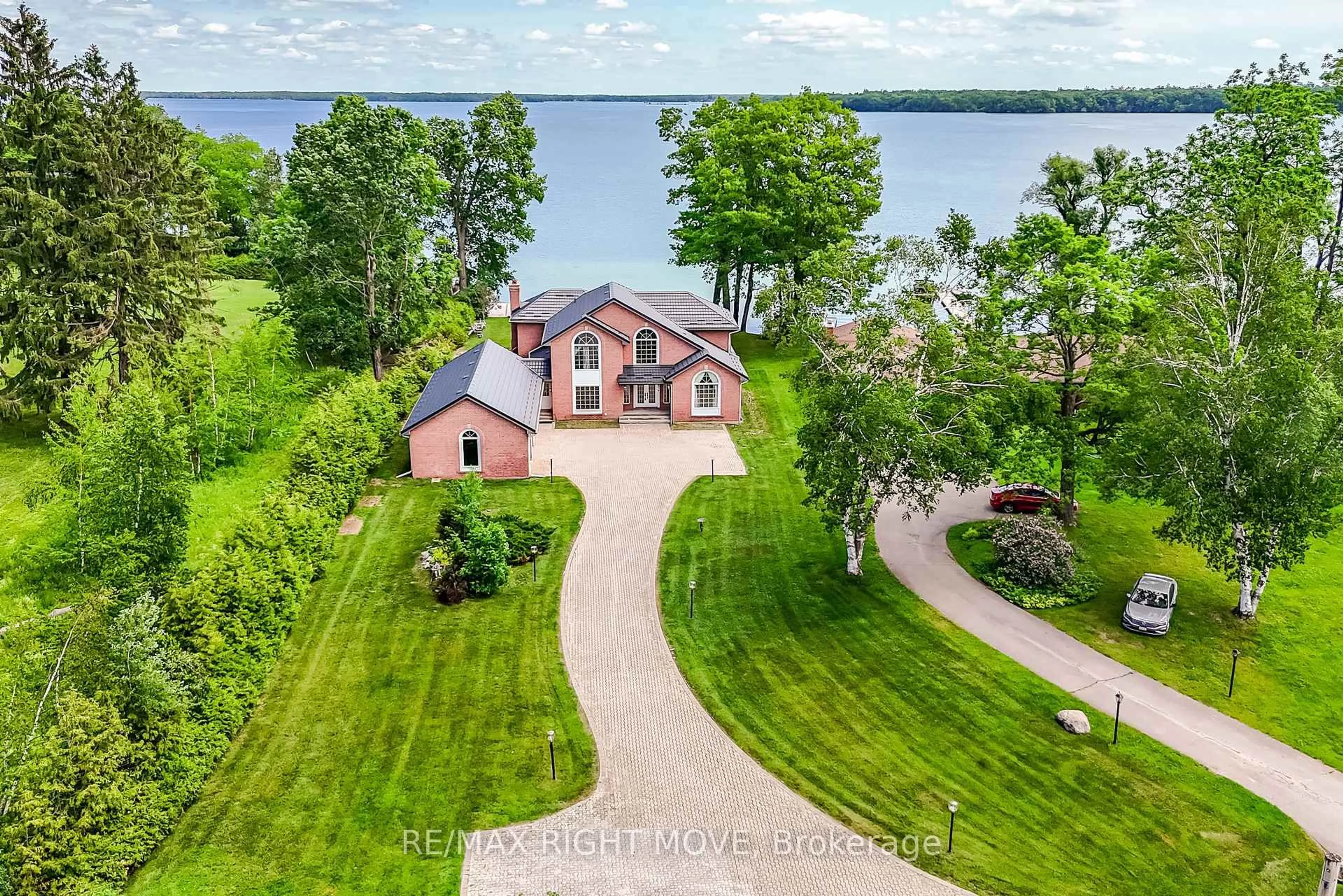 A pic from outside/outdoor area/front of a property/back of a property/a pic from drone, water/lake/river/ocean view for 4229 Wilson Point Rd, Severn Ontario L3V 7E1