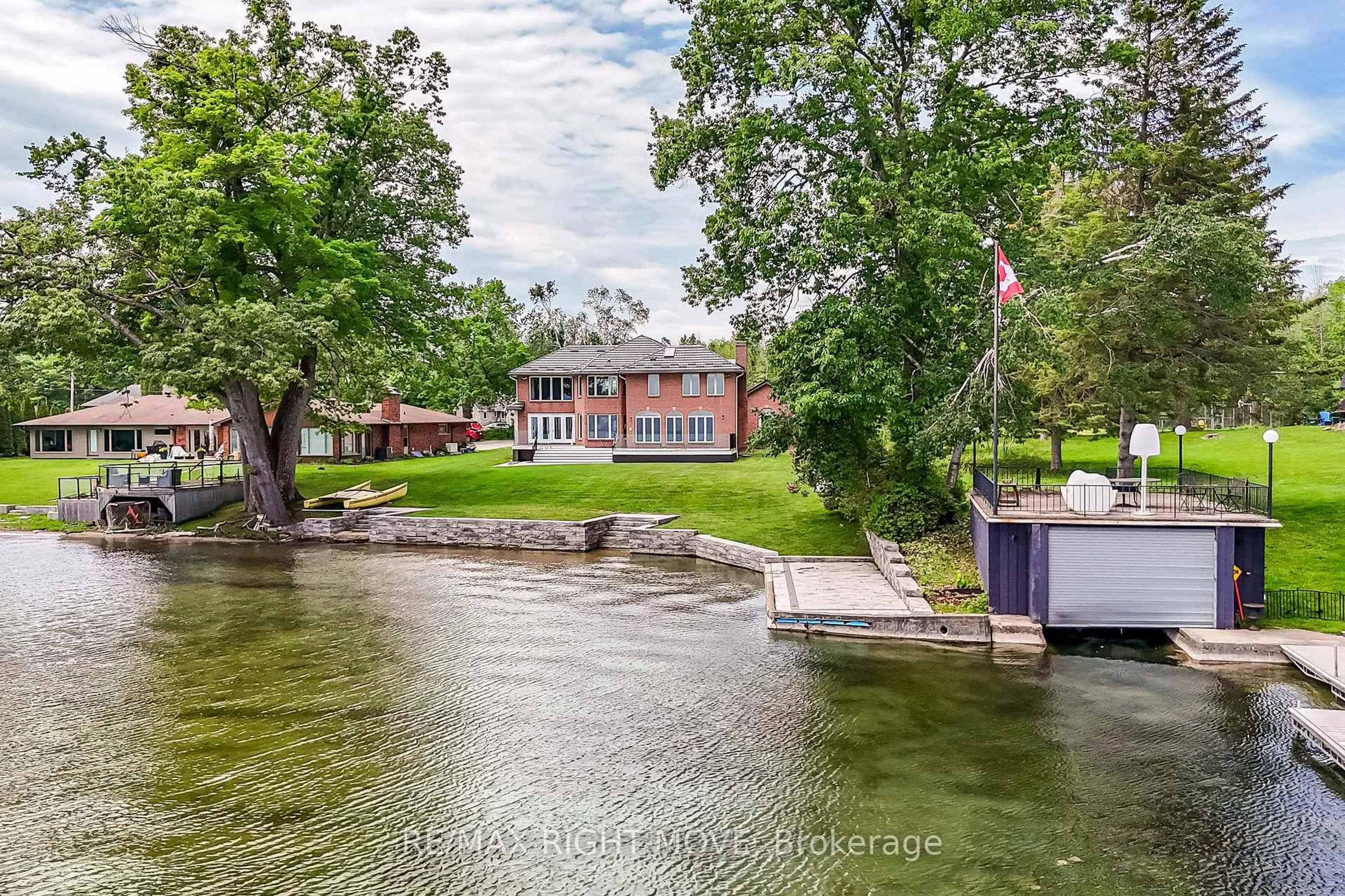 A pic from outside/outdoor area/front of a property/back of a property/a pic from drone, water/lake/river/ocean view for 4229 Wilson Point Rd, Severn Ontario L3V 7E1