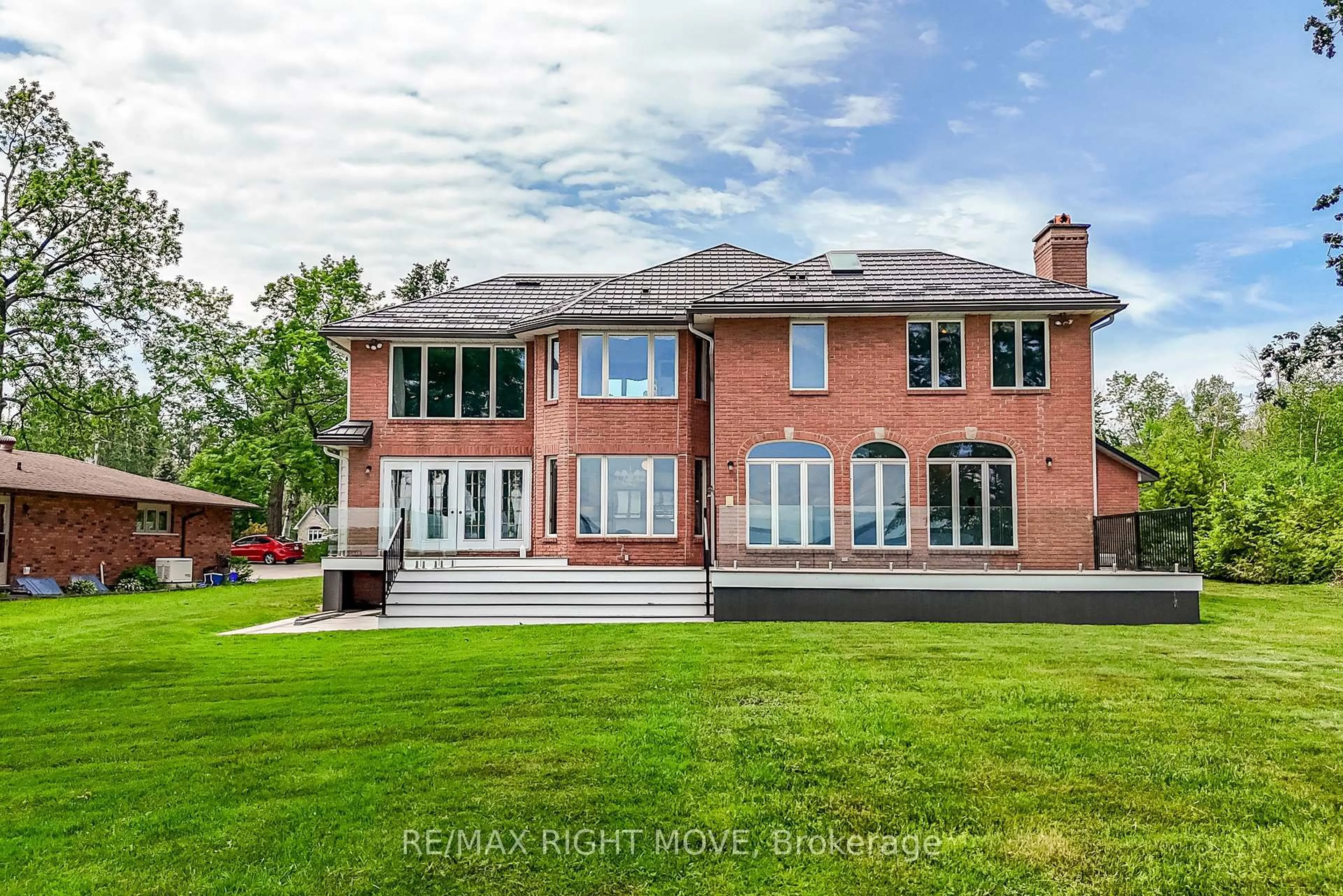 A pic from outside/outdoor area/front of a property/back of a property/a pic from drone, water/lake/river/ocean view for 4229 Wilson Point Rd, Severn Ontario L3V 7E1