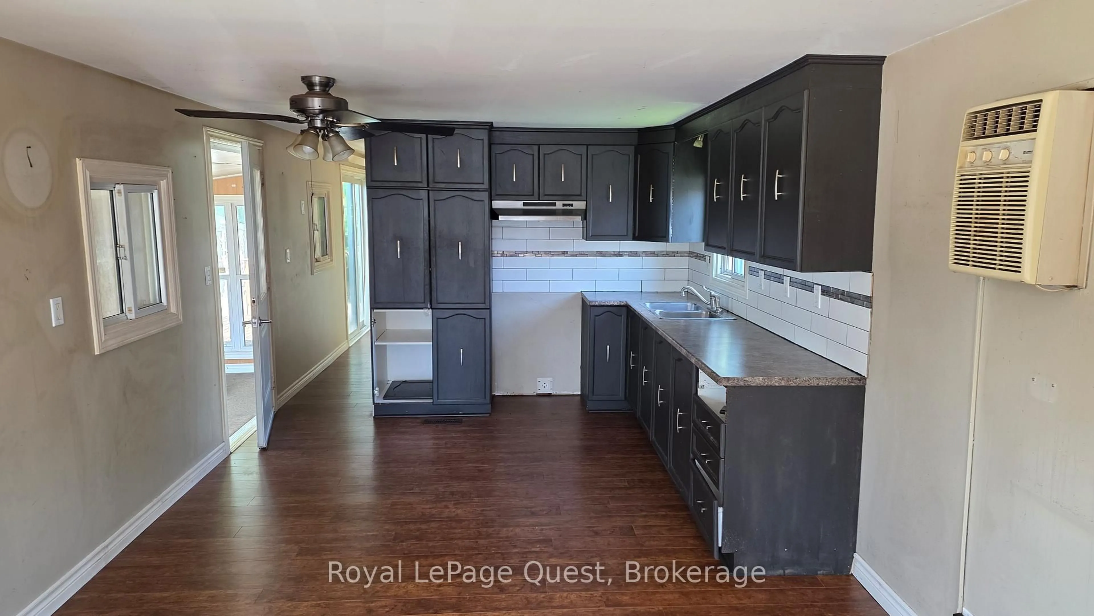 Open concept kitchen, wood/laminate floor for 26 DUNN Ave #17, Orillia Ontario L3V 2N9