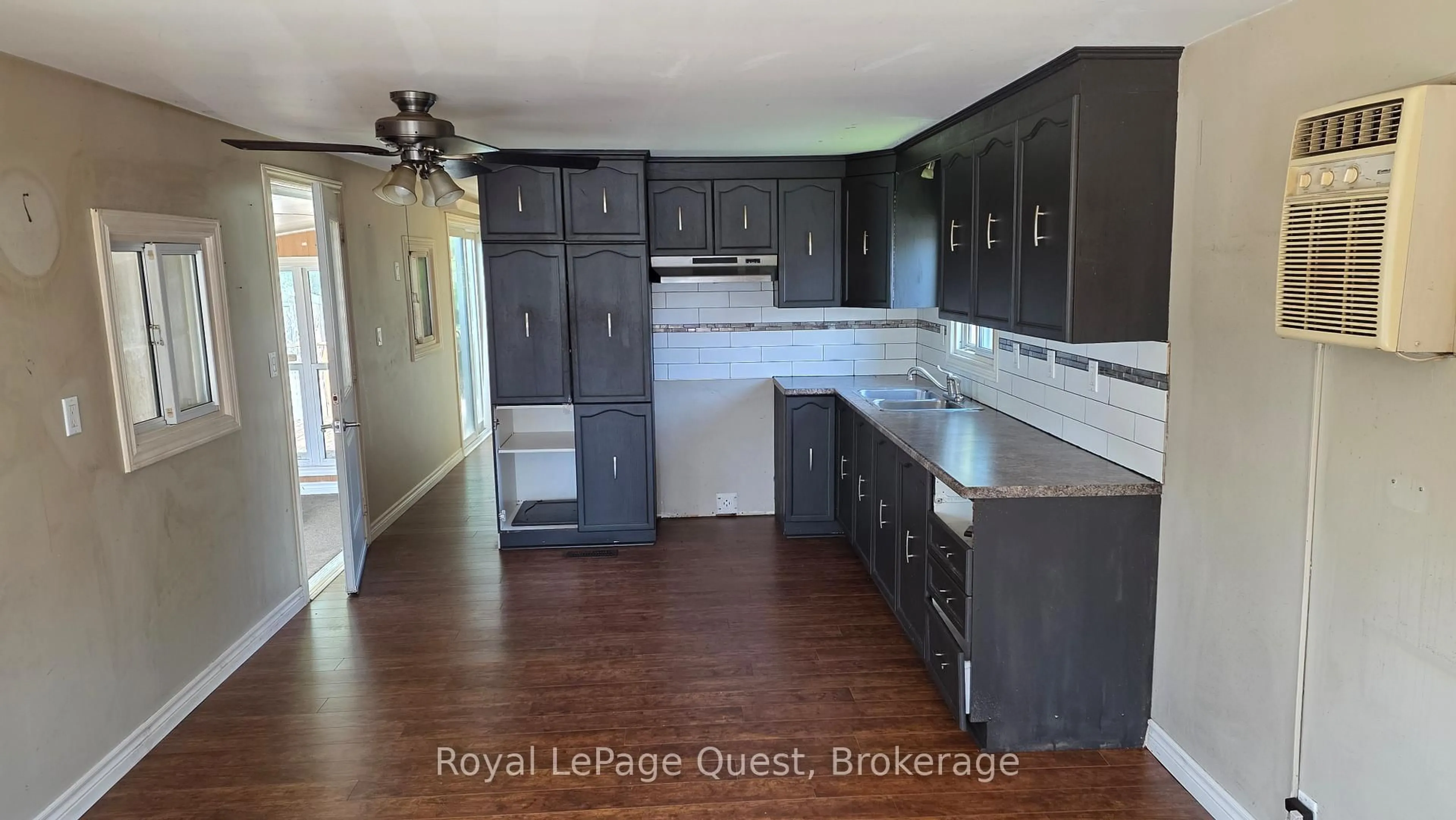 Open concept kitchen, wood/laminate floor for 26 DUNN Ave #17, Orillia Ontario L3V 2N9