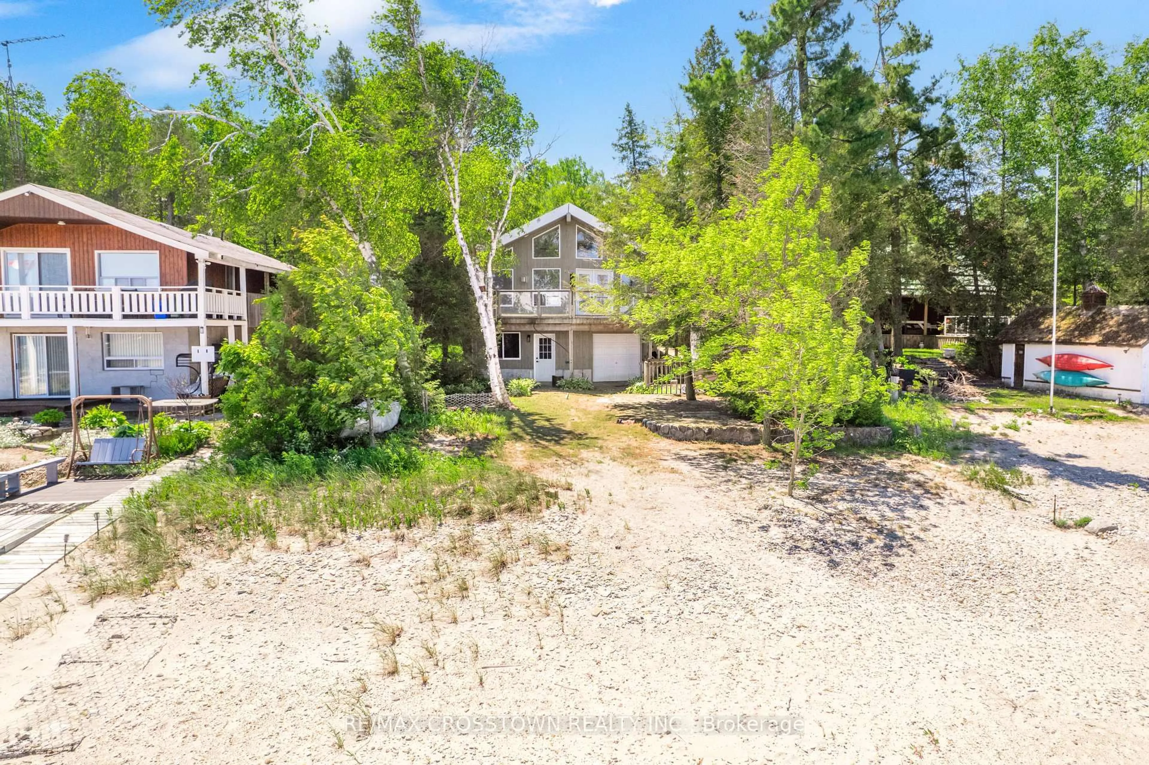 A pic from outside/outdoor area/front of a property/back of a property/a pic from drone, water/lake/river/ocean view for 1799 Champlain Rd, Tiny Ontario L9M 0B6