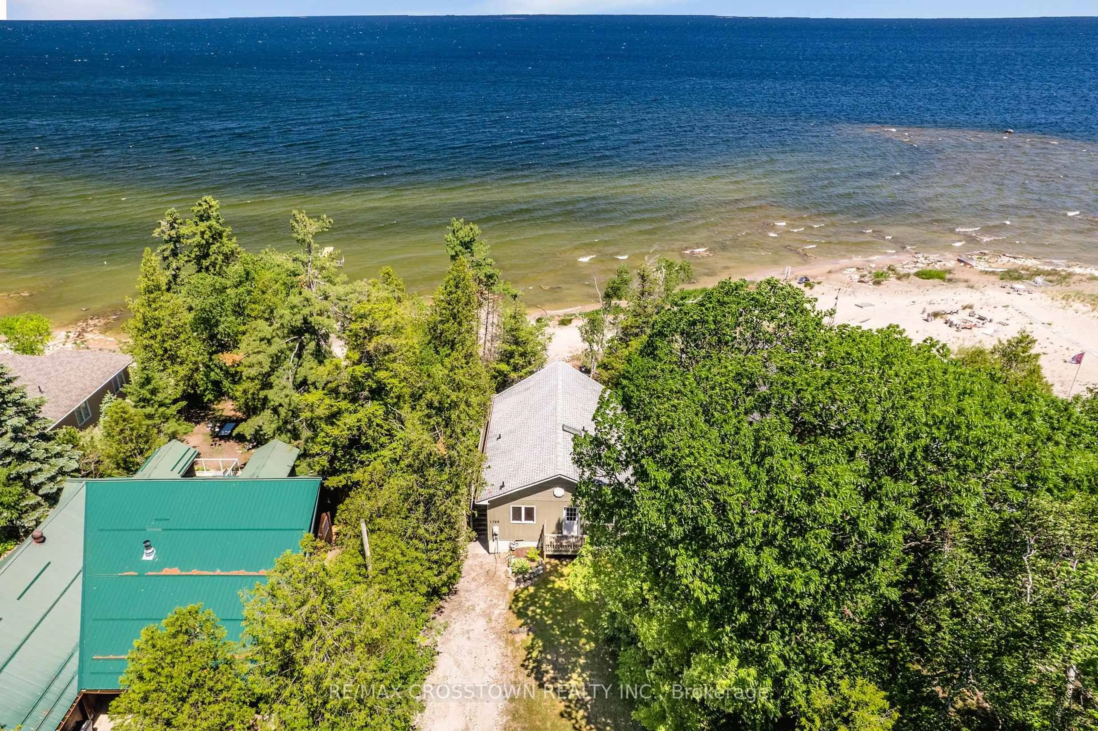 A pic from outside/outdoor area/front of a property/back of a property/a pic from drone, water/lake/river/ocean view for 1799 Champlain Rd, Tiny Ontario L9M 0B6