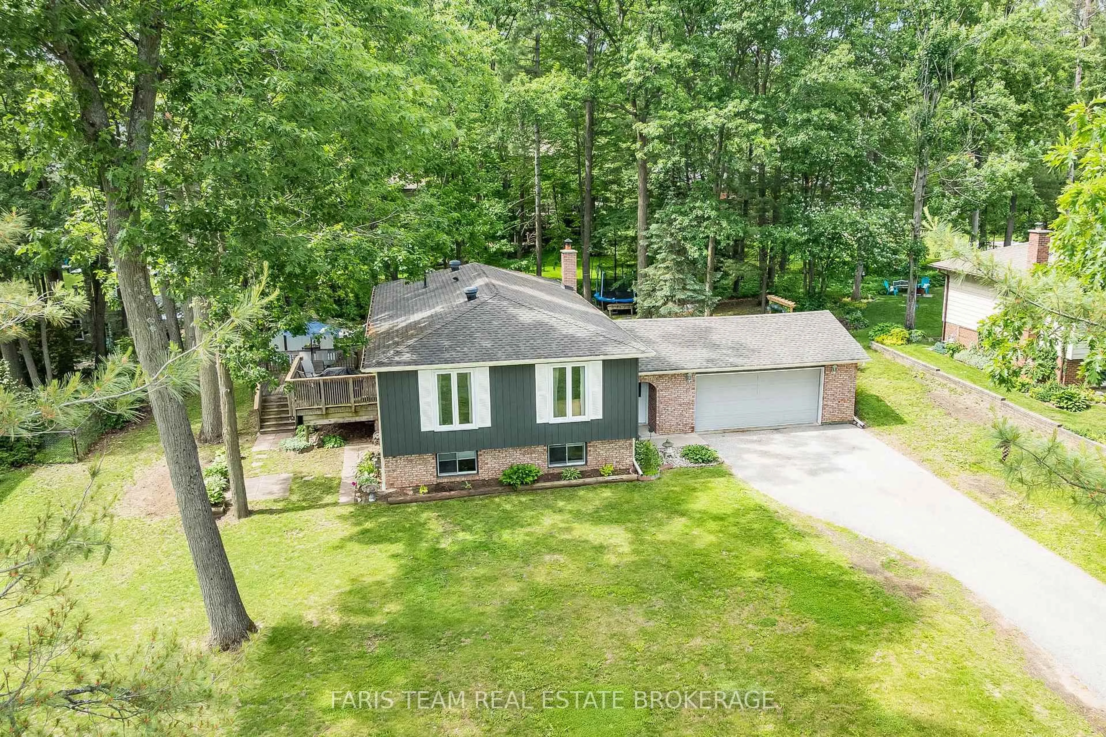 A pic from outside/outdoor area/front of a property/back of a property/a pic from drone, unknown for 1202 Sunnidale Rd, Springwater Ontario L4M 4S4