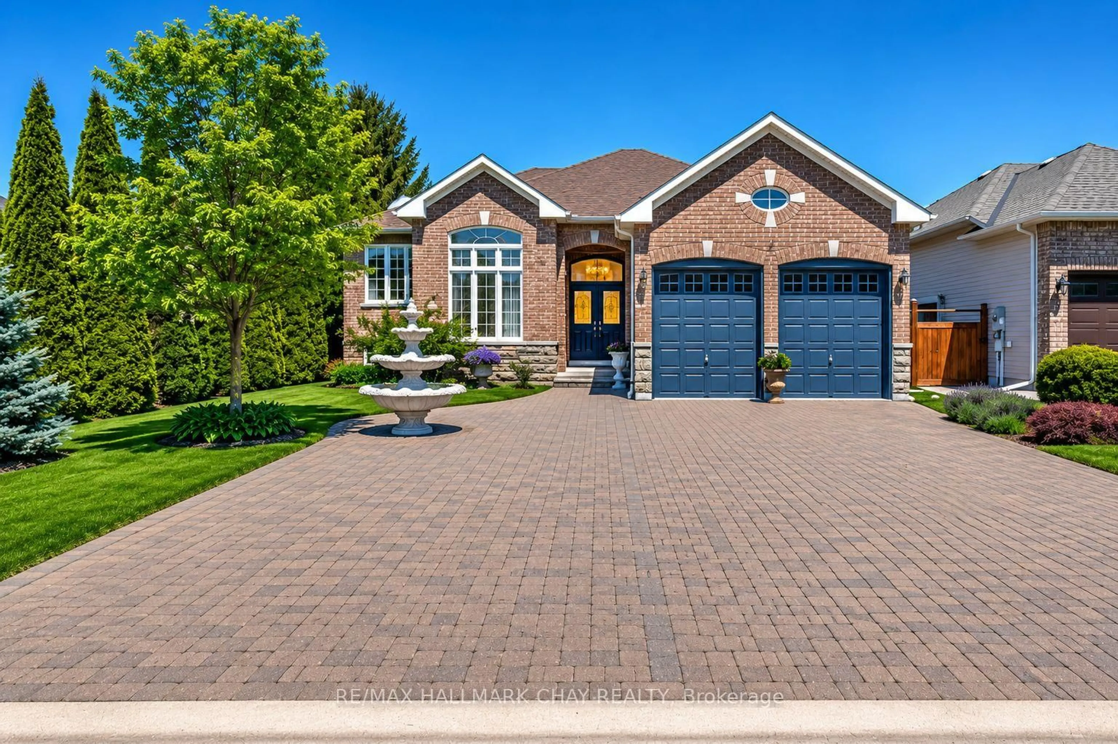 Home with brick exterior material, street for 2 Old Hickory Lane, Wasaga Beach Ontario L9Z 3A9