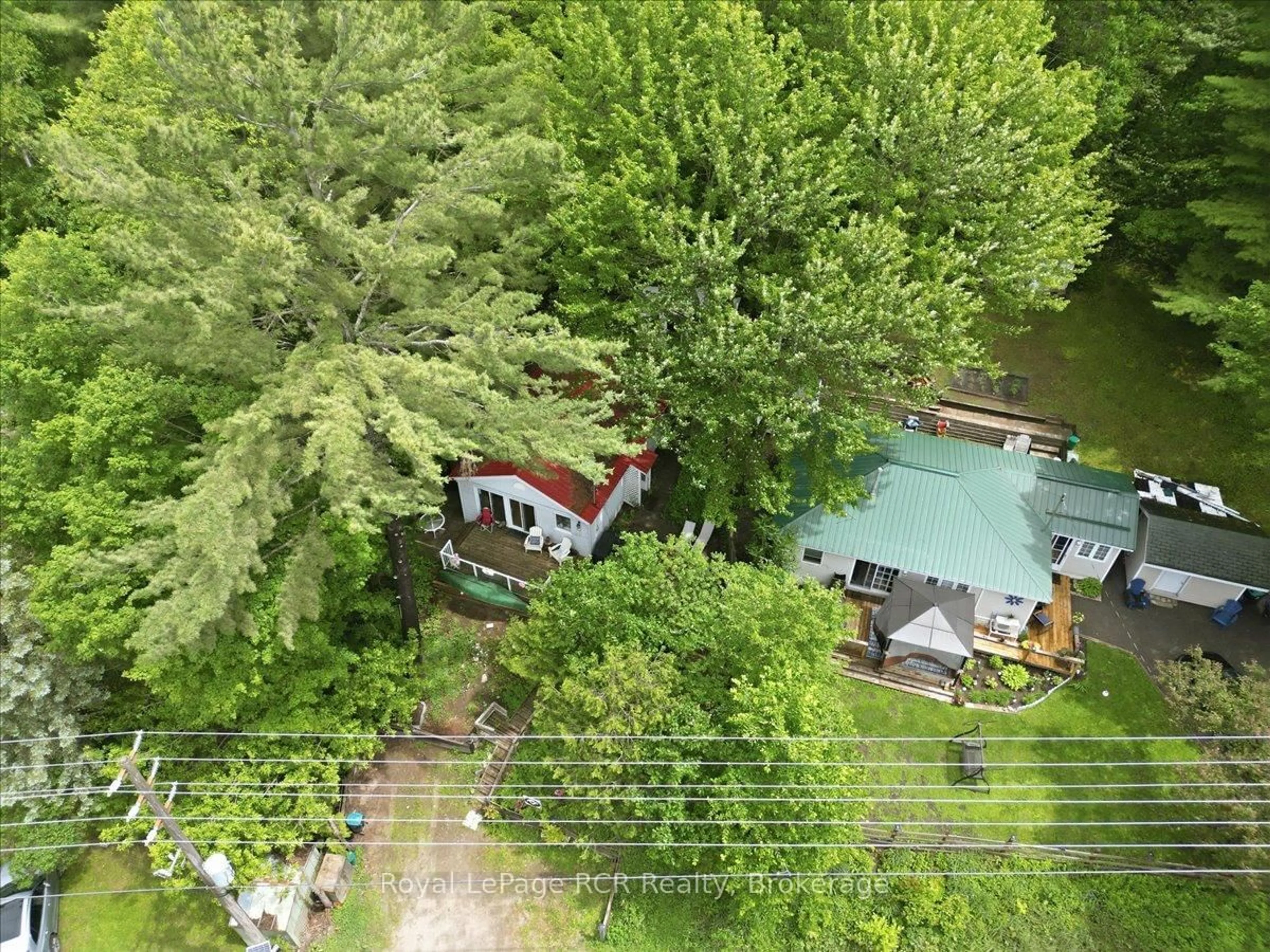 A pic from outside/outdoor area/front of a property/back of a property/a pic from drone, water/lake/river/ocean view for 45 Andrew Dr, Tiny Ontario L9M 0B4