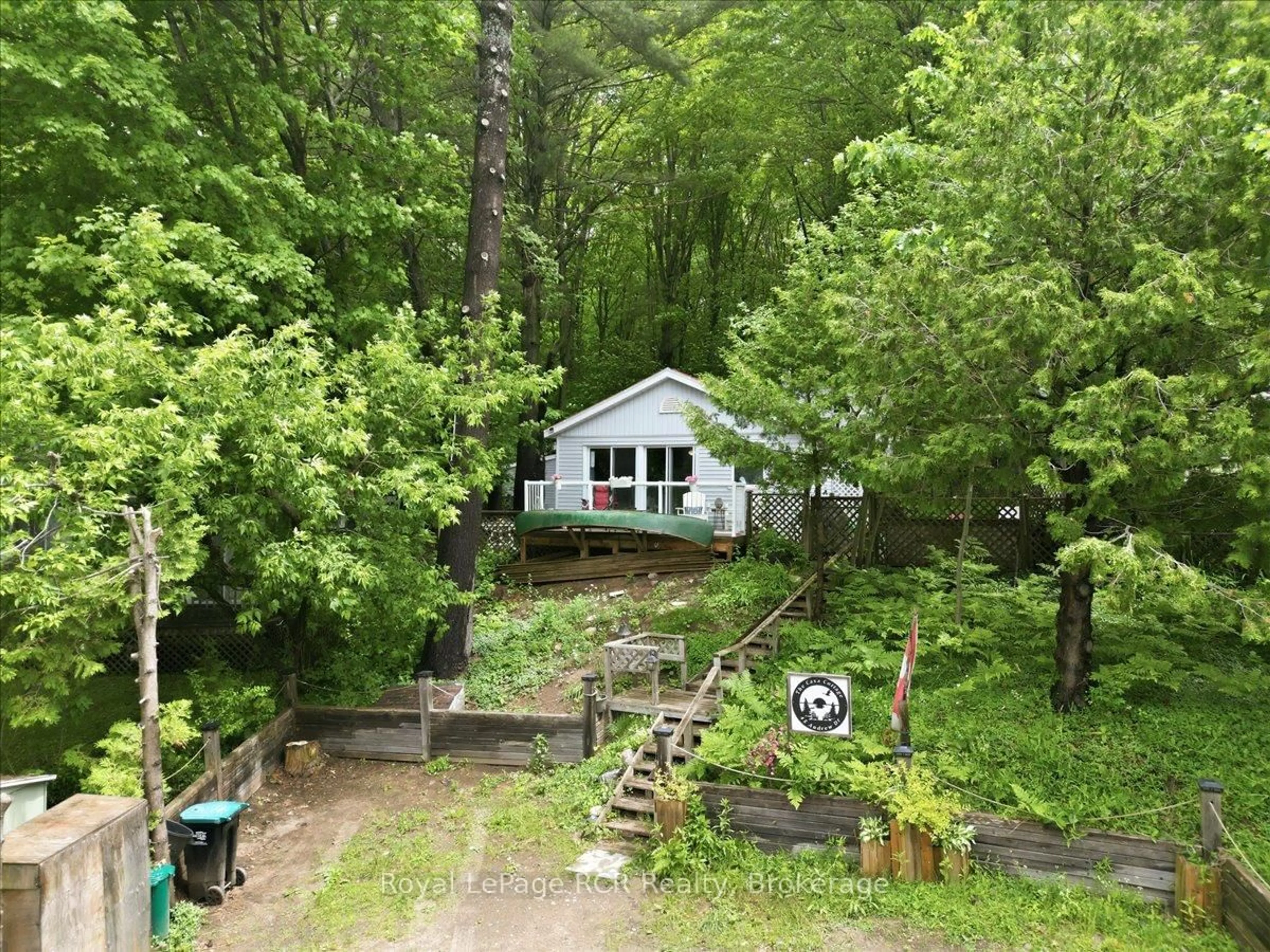 A pic from outside/outdoor area/front of a property/back of a property/a pic from drone, forest/trees view for 45 Andrew Dr, Tiny Ontario L9M 0B4