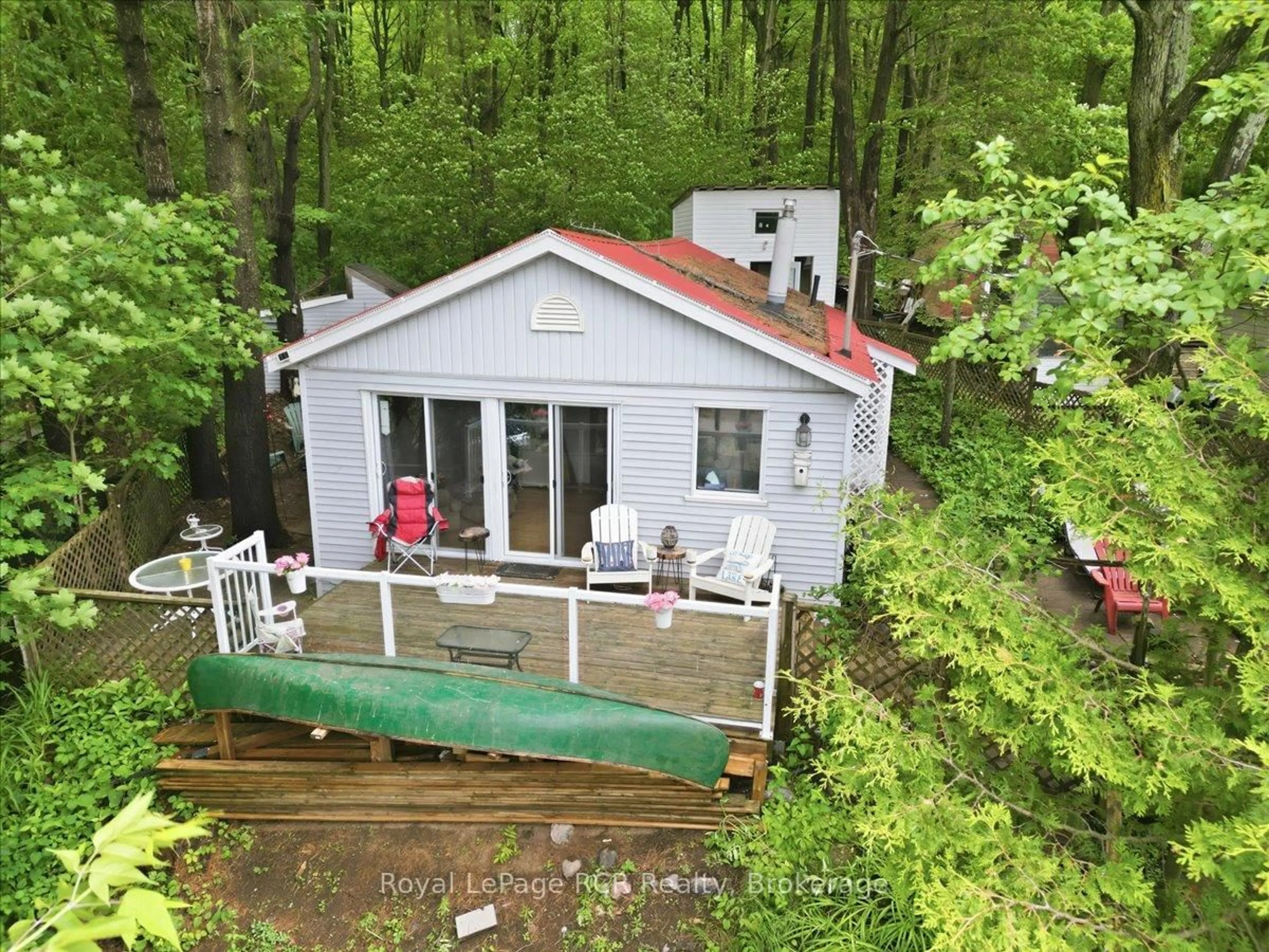 A pic from outside/outdoor area/front of a property/back of a property/a pic from drone, water/lake/river/ocean view for 45 Andrew Dr, Tiny Ontario L9M 0B4