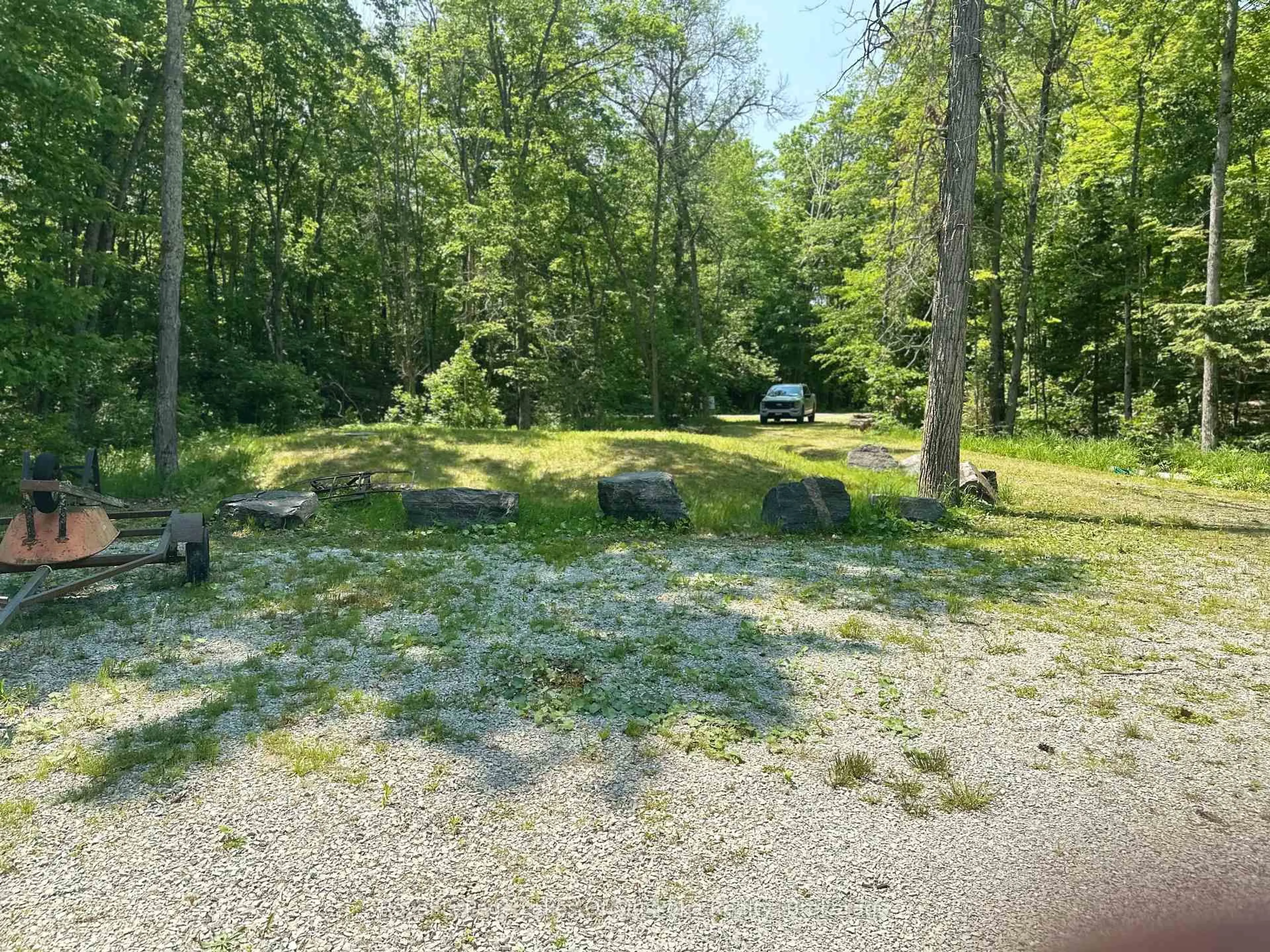 A pic from outside/outdoor area/front of a property/back of a property/a pic from drone, forest/trees view for 3118 Grange Ave, Severn Ontario P0E 1N0
