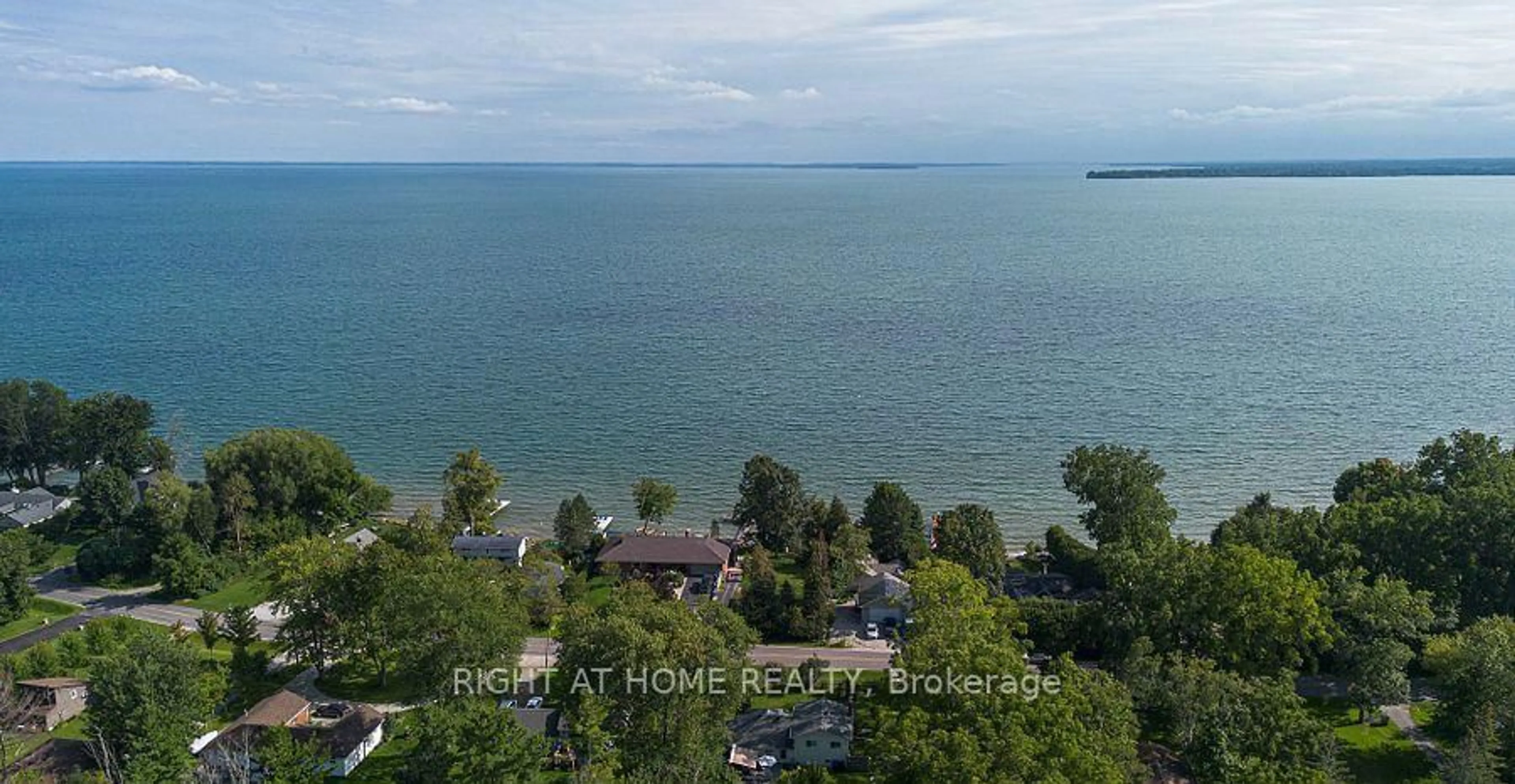 A pic from outside/outdoor area/front of a property/back of a property/a pic from drone, water/lake/river/ocean view for 12 Lakeshore Rd, Oro-Medonte Ontario L0L 2E0