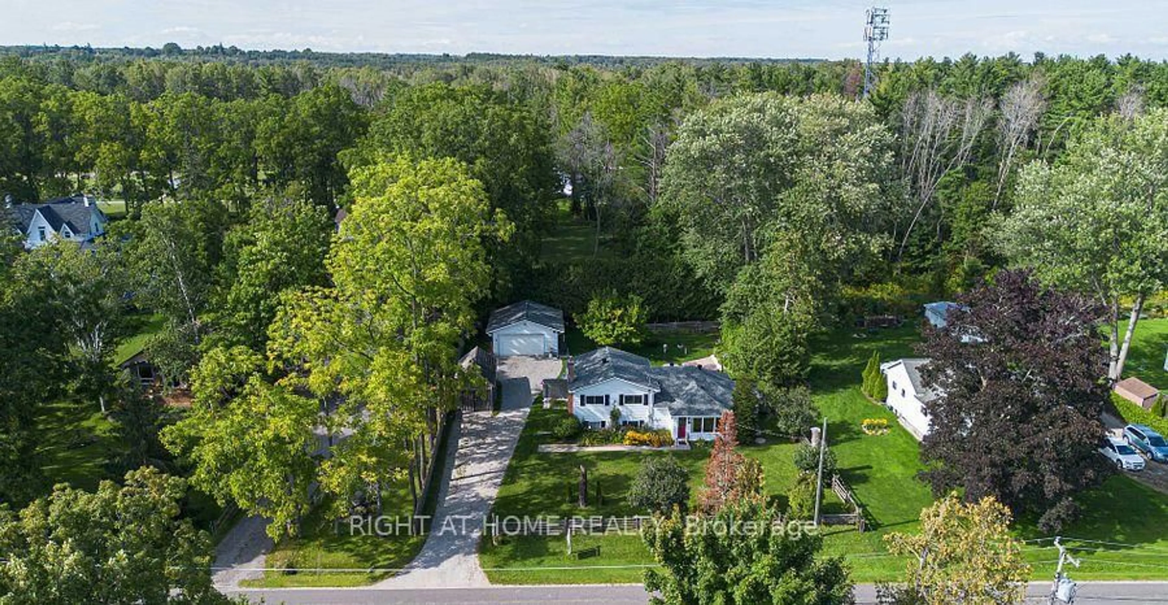 A pic from outside/outdoor area/front of a property/back of a property/a pic from drone, street for 12 Lakeshore Rd, Oro-Medonte Ontario L0L 2E0