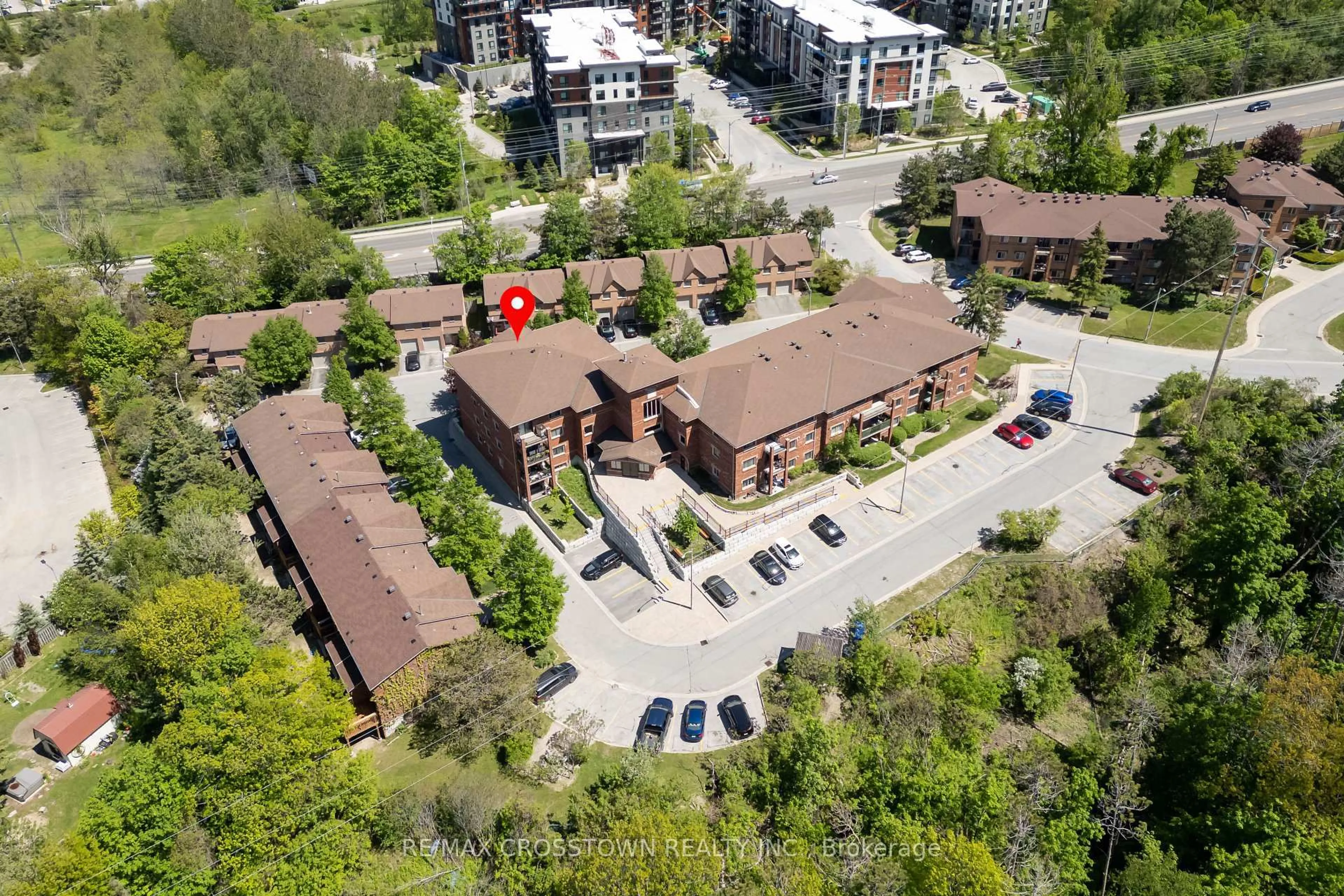 A pic from outside/outdoor area/front of a property/back of a property/a pic from drone, unknown for 1 Quail Cres #303, Barrie Ontario L4N 6W9