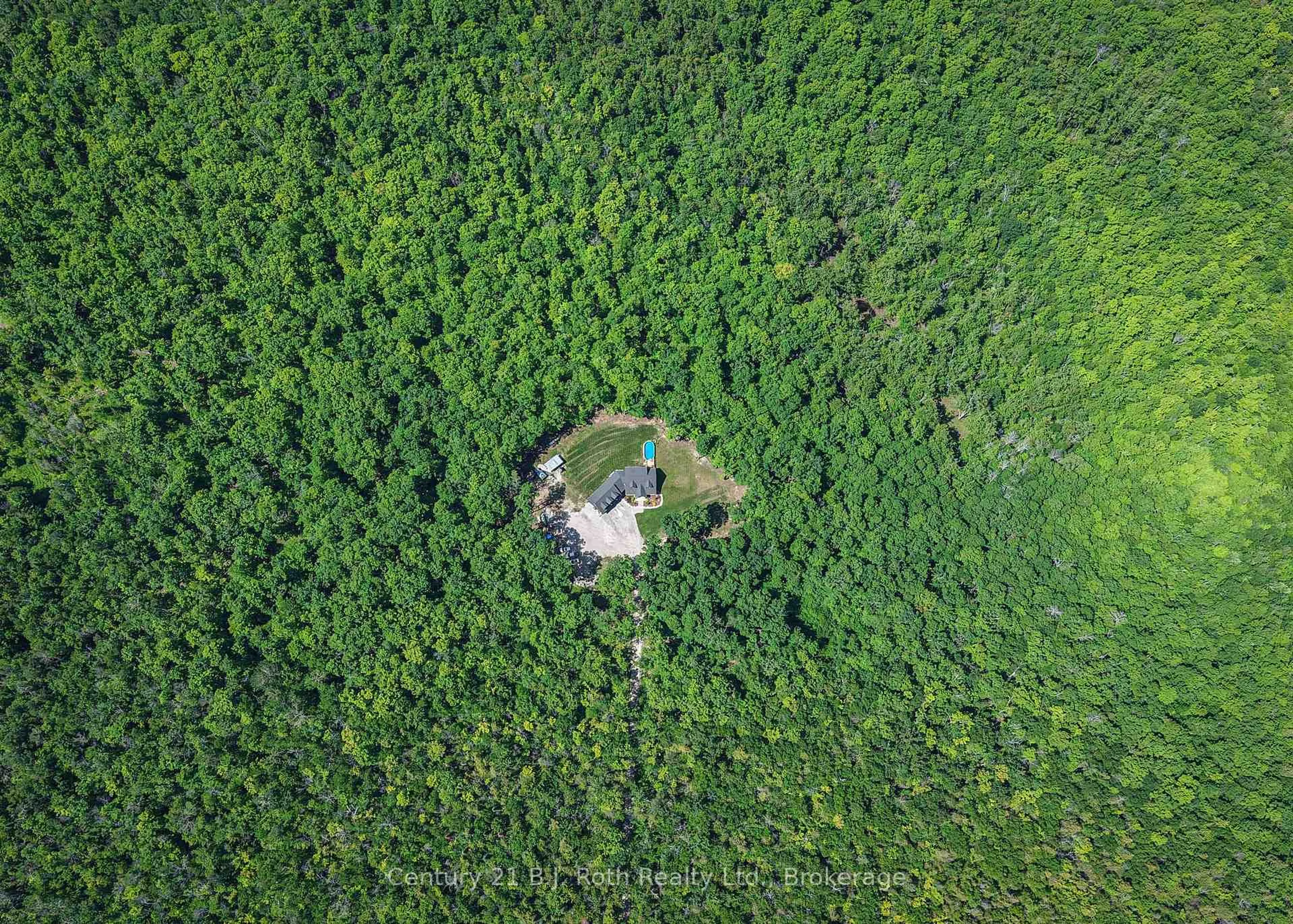 A pic from outside/outdoor area/front of a property/back of a property/a pic from drone, forest/trees view for 3082 Fairgrounds Rd, Severn Ontario L3V 0Y2