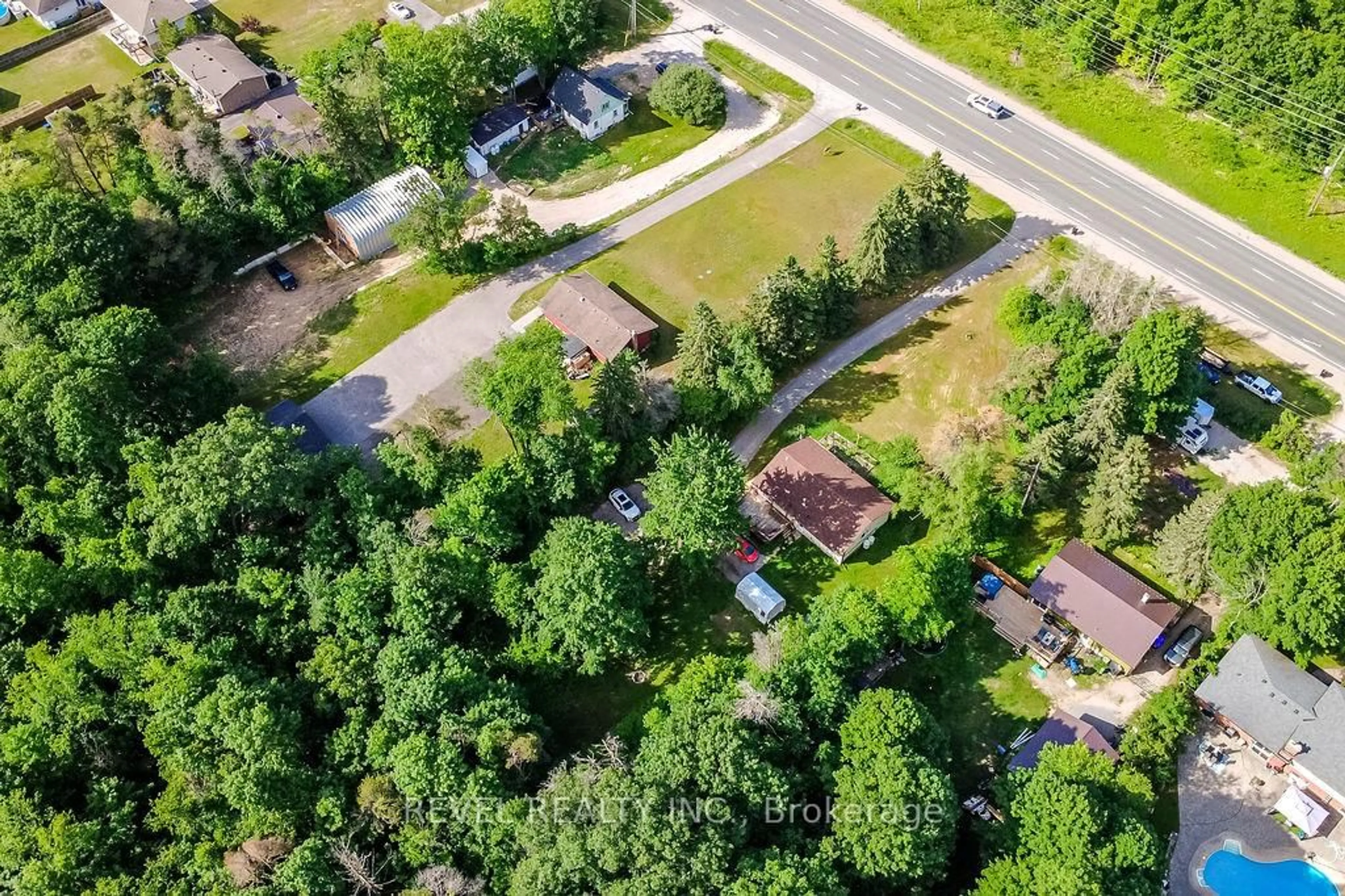 A pic from outside/outdoor area/front of a property/back of a property/a pic from drone, water/lake/river/ocean view for 11553 COUNTY ROAD 27 Rd, Springwater Ontario L0L 1X1
