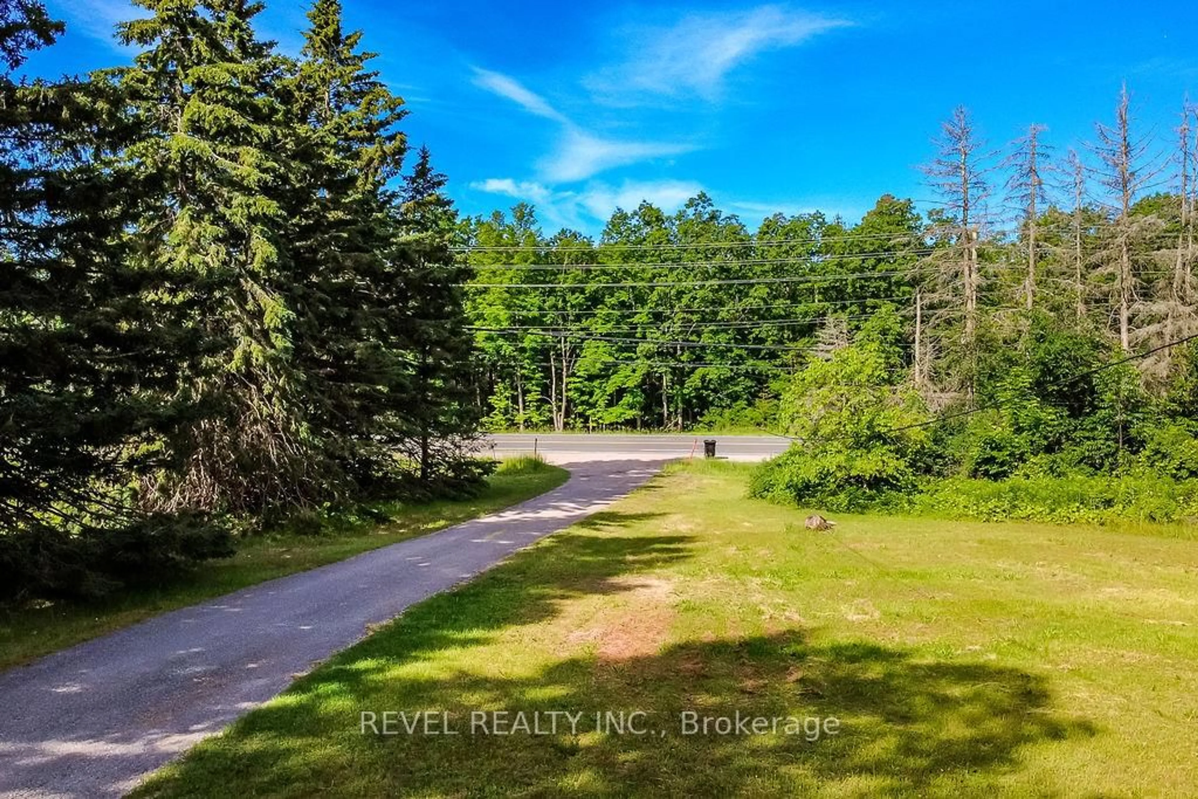 A pic from outside/outdoor area/front of a property/back of a property/a pic from drone, forest/trees view for 11553 COUNTY ROAD 27 Rd, Springwater Ontario L0L 1X1