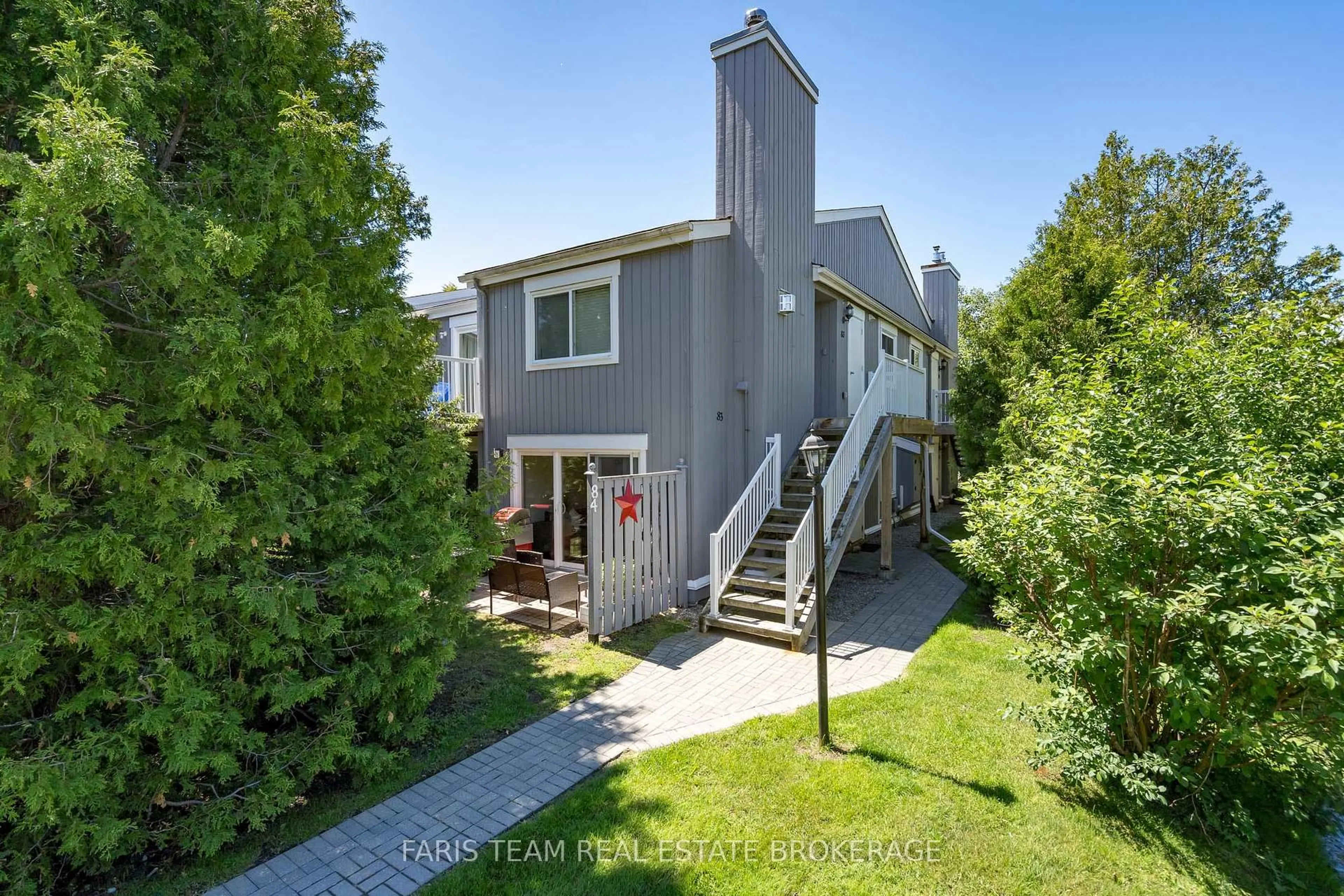 A pic from outside/outdoor area/front of a property/back of a property/a pic from drone, street for 23 Dawson Dr #84, Collingwood Ontario L9Y 5B4