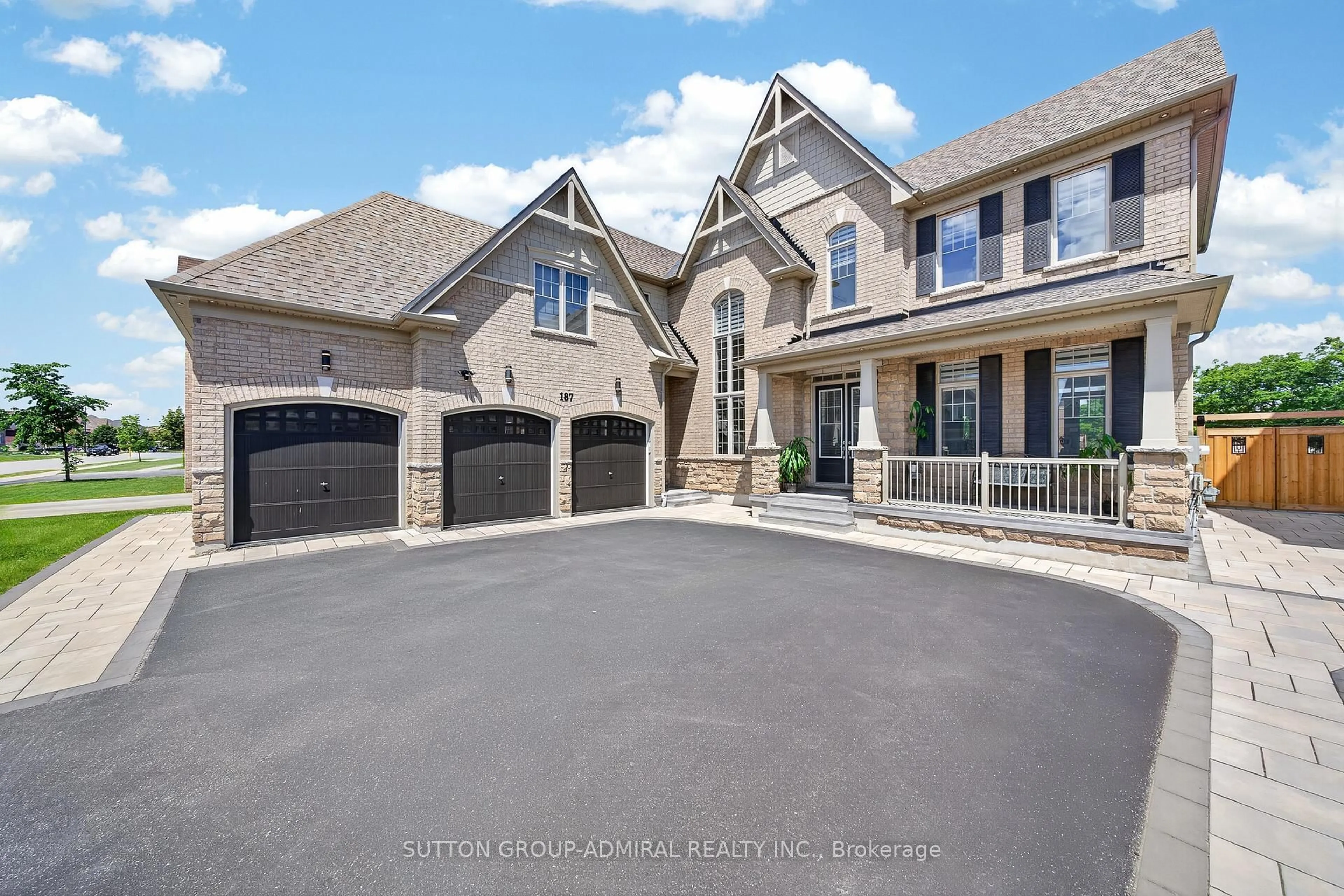 Home with brick exterior material, street for 187 Trail Blvd, Springwater Ontario L9X 1A8