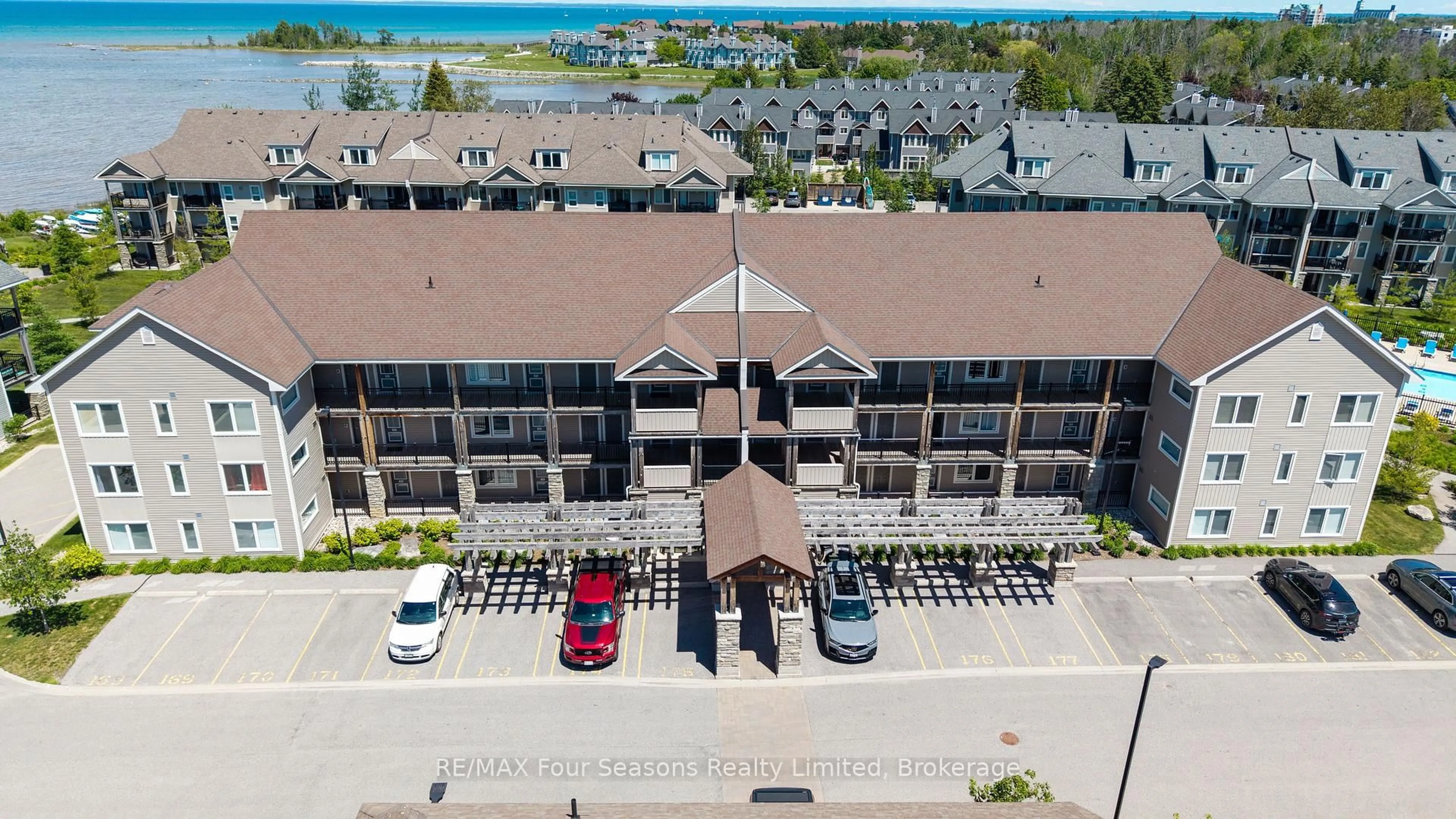 A pic from outside/outdoor area/front of a property/back of a property/a pic from drone, water/lake/river/ocean view for 5 Anchorage Cres #104, Collingwood Ontario L9Y 0Y6
