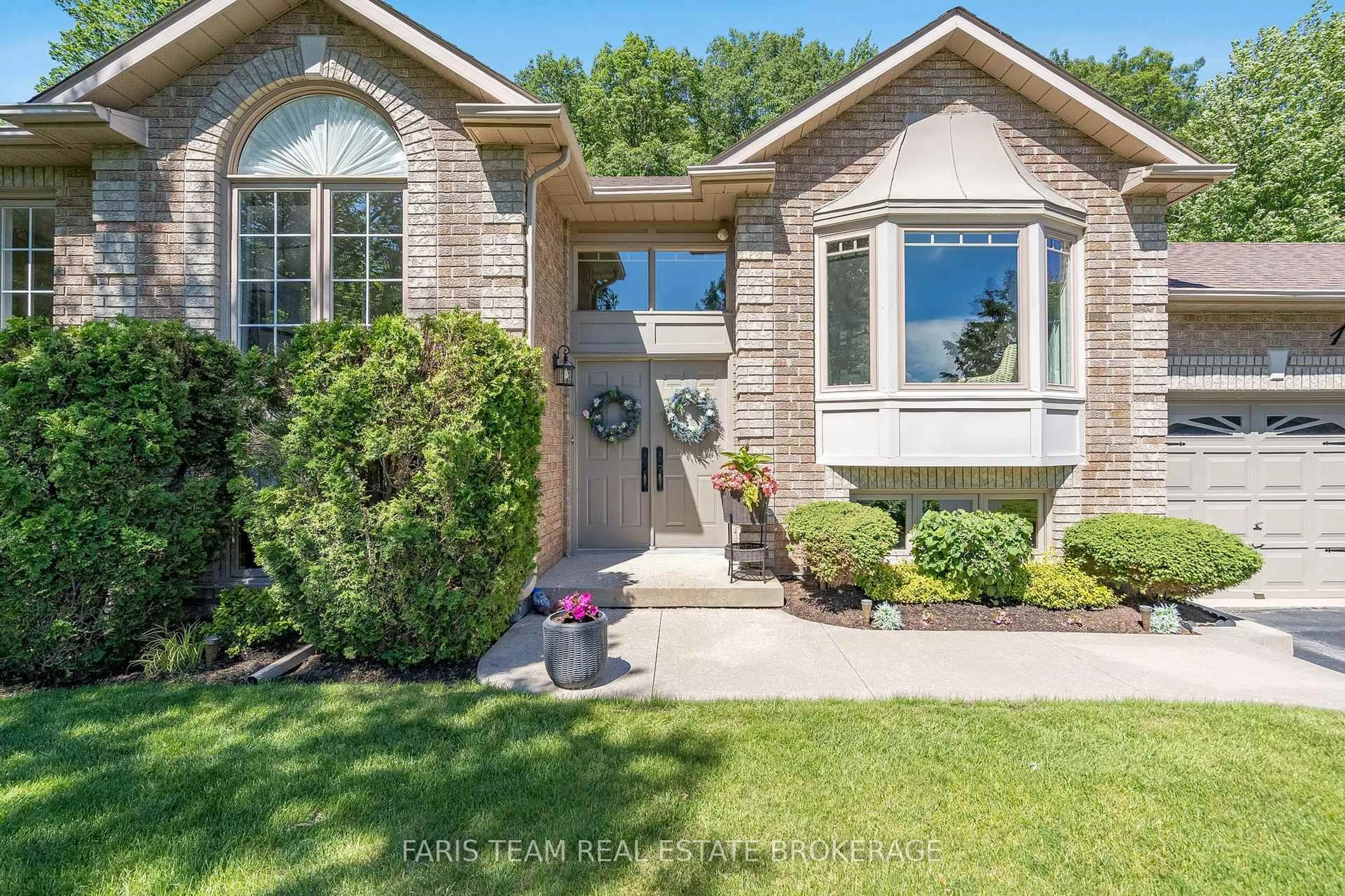 Home with brick exterior material, street for 1 Rigby Dr, Wasaga Beach Ontario L9Z 1J1