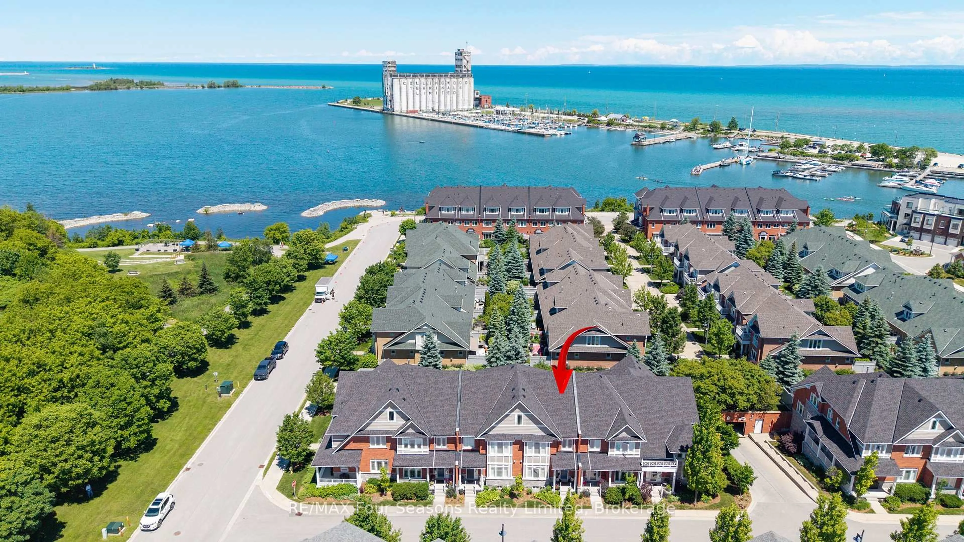 A pic from outside/outdoor area/front of a property/back of a property/a pic from drone, water/lake/river/ocean view for 17 Collship Lane, Collingwood Ontario L9Y 0J6