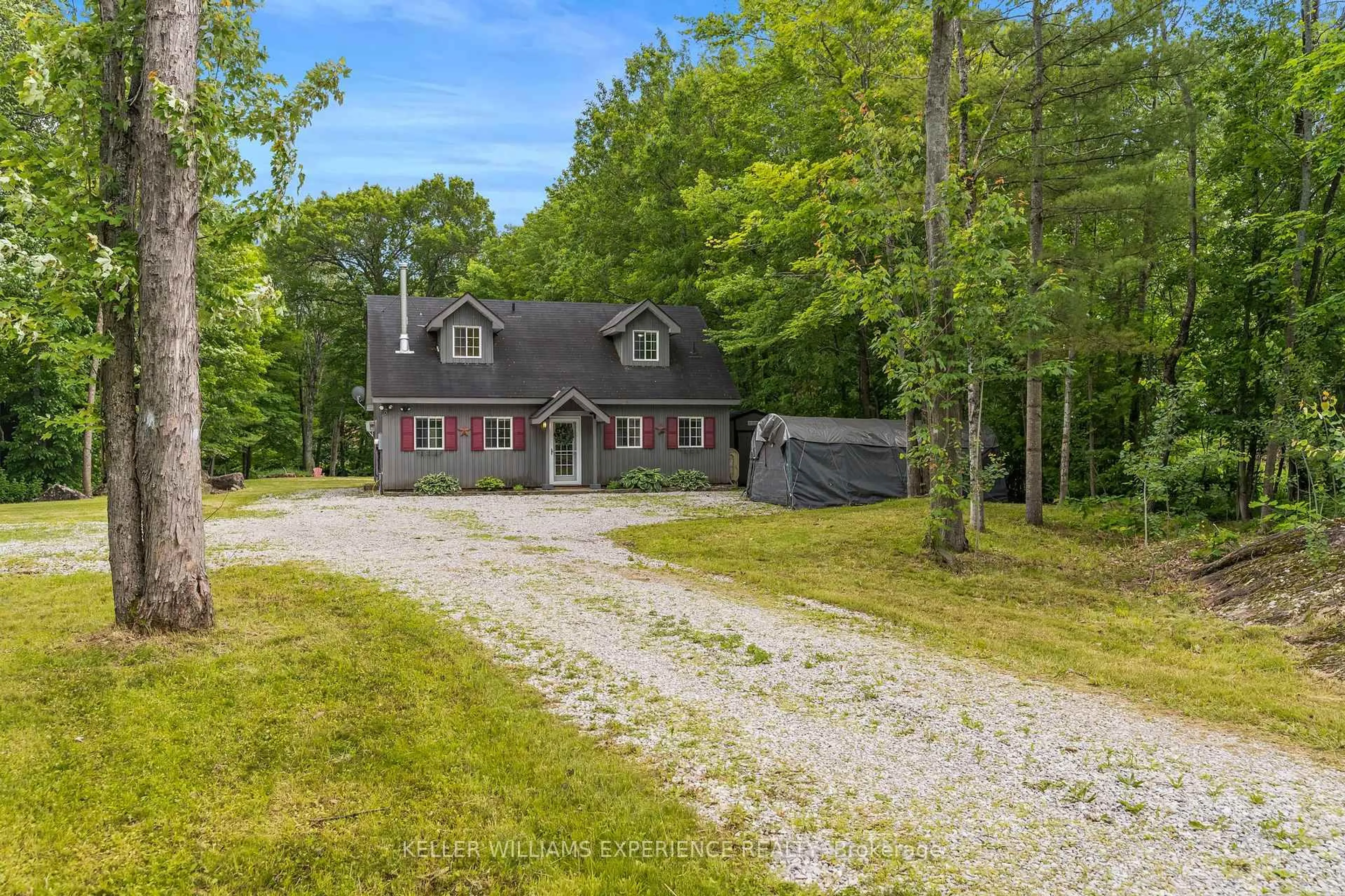 A pic from outside/outdoor area/front of a property/back of a property/a pic from drone, street for 7516 Island Cres, Ramara Ontario L0K 2B0