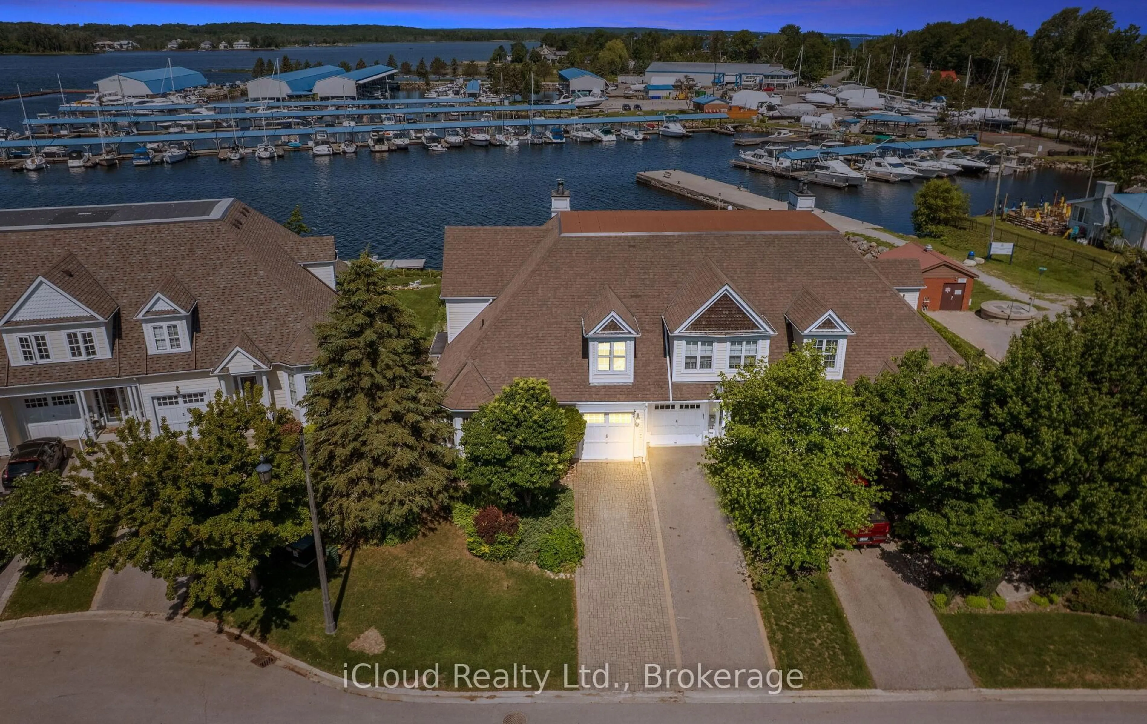 A pic from outside/outdoor area/front of a property/back of a property/a pic from drone, water/lake/river/ocean view for 104 Wycliffe Cove, Tay Ontario L0K 2A0