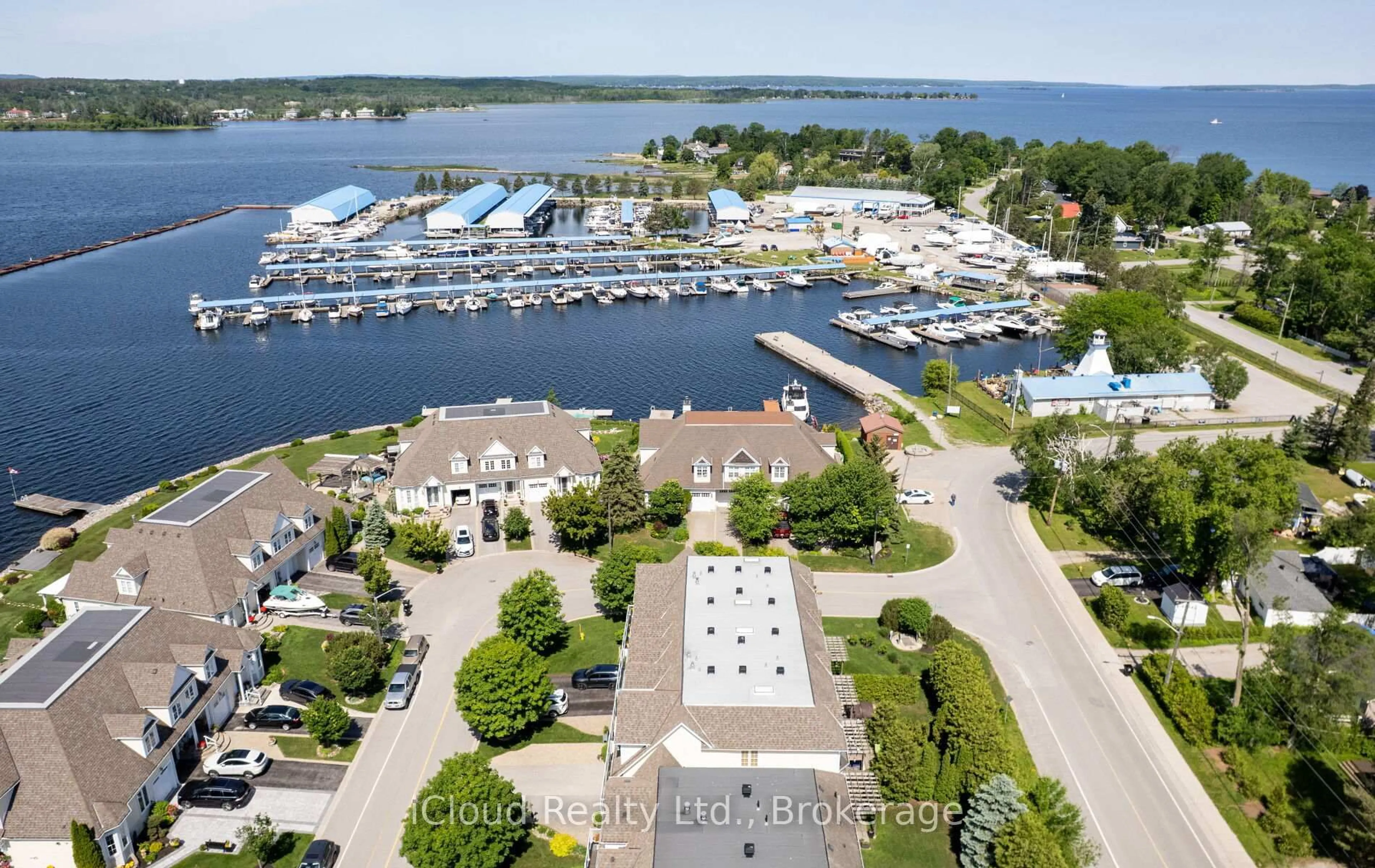 A pic from outside/outdoor area/front of a property/back of a property/a pic from drone, water/lake/river/ocean view for 104 Wycliffe Cove, Tay Ontario L0K 2A0