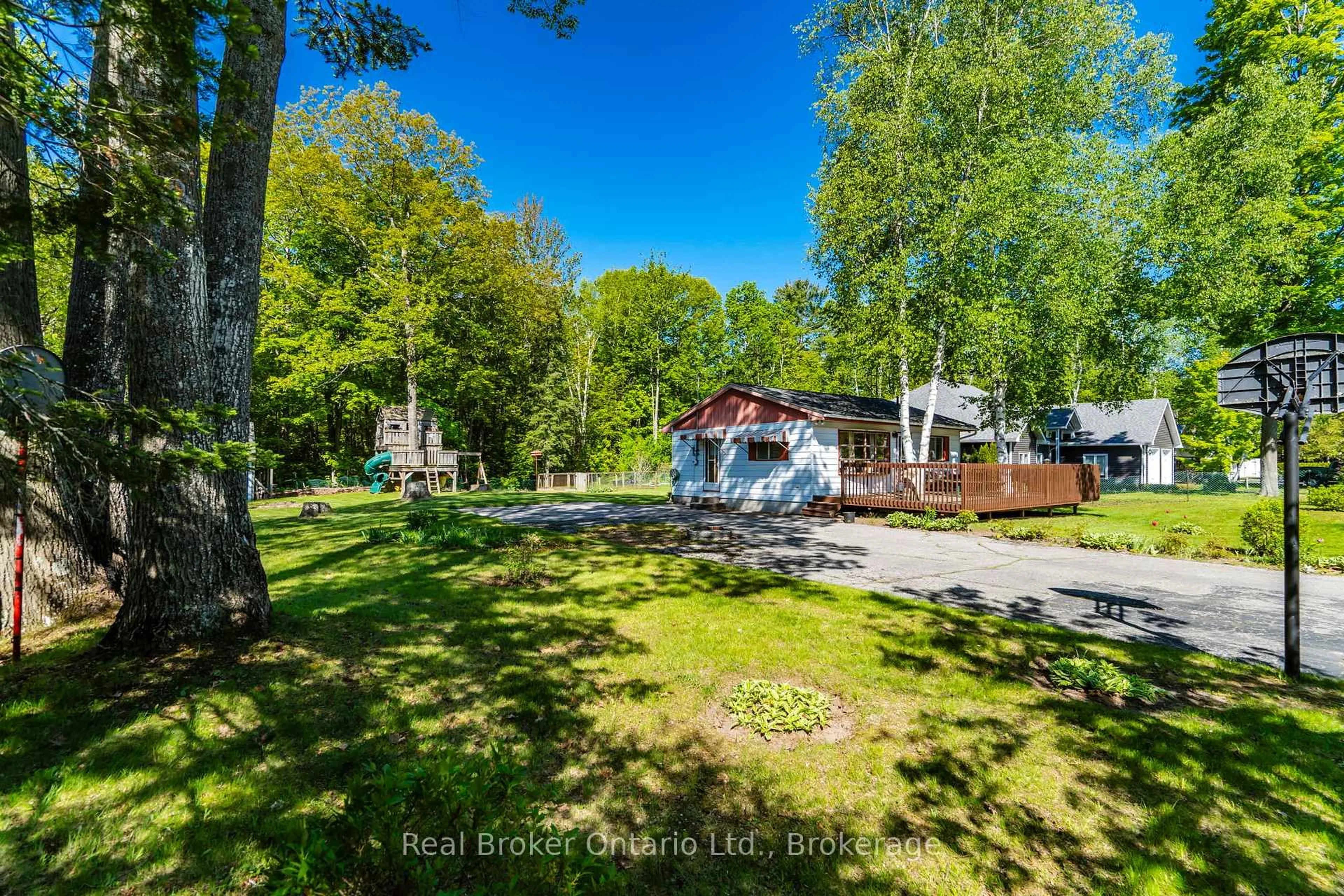 A pic from outside/outdoor area/front of a property/back of a property/a pic from drone, forest/trees view for 24 Poplar Dr, Tiny Ontario L9M 0J2