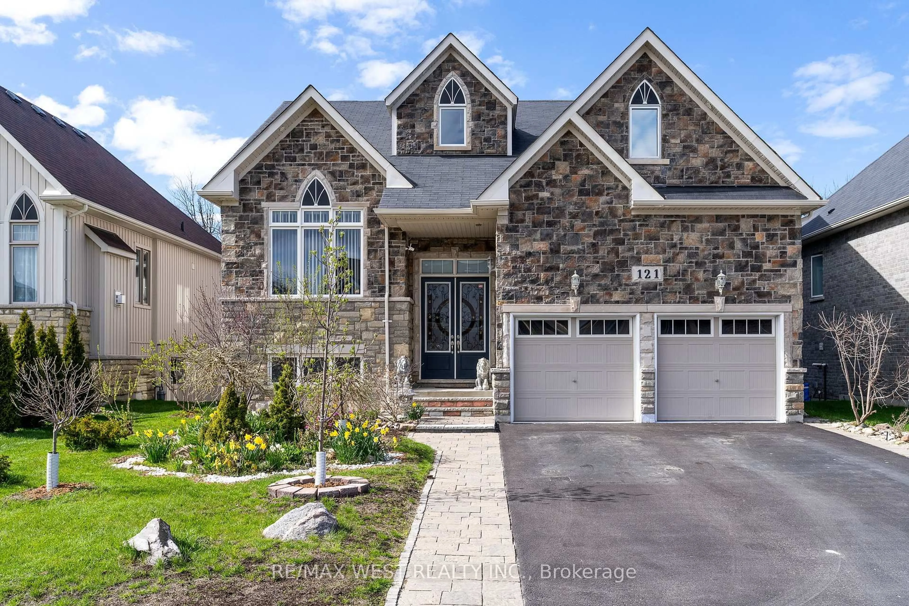 Home with brick exterior material, street for 121 Allegra Dr, Wasaga Beach Ontario L9Z 1P2