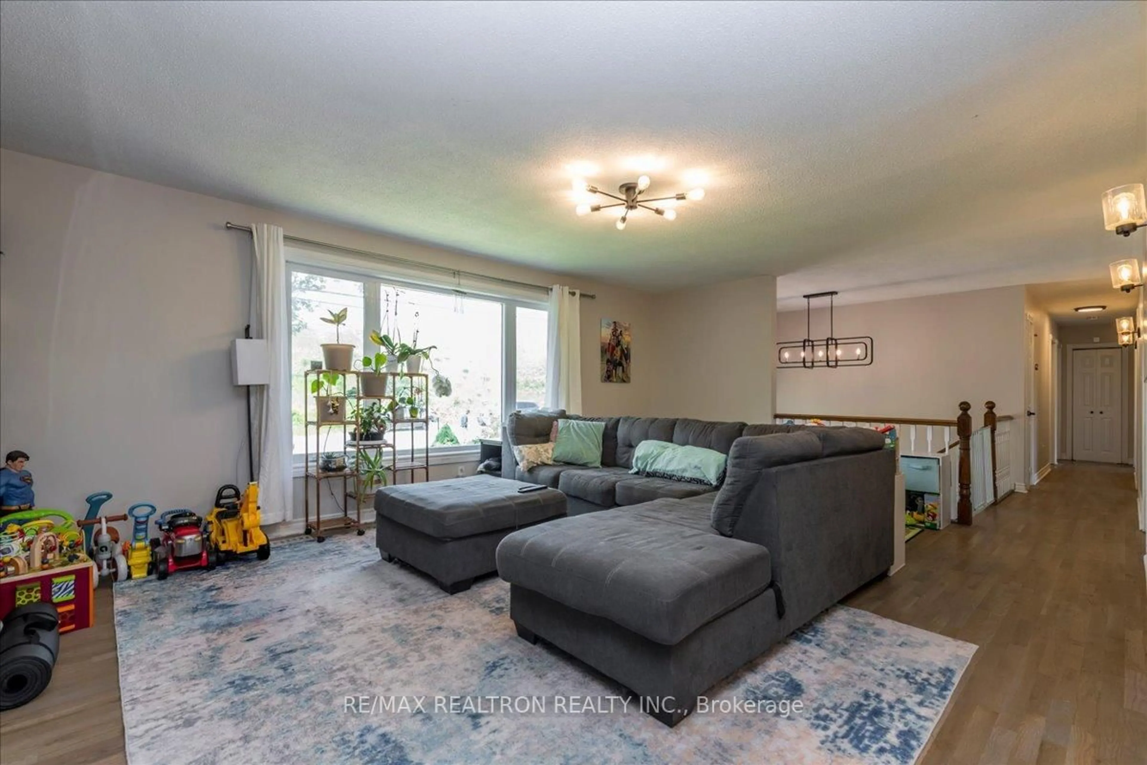 Living room with furniture, unknown for 4261 Huronia Rd, Orillia Ontario L3V 0G8