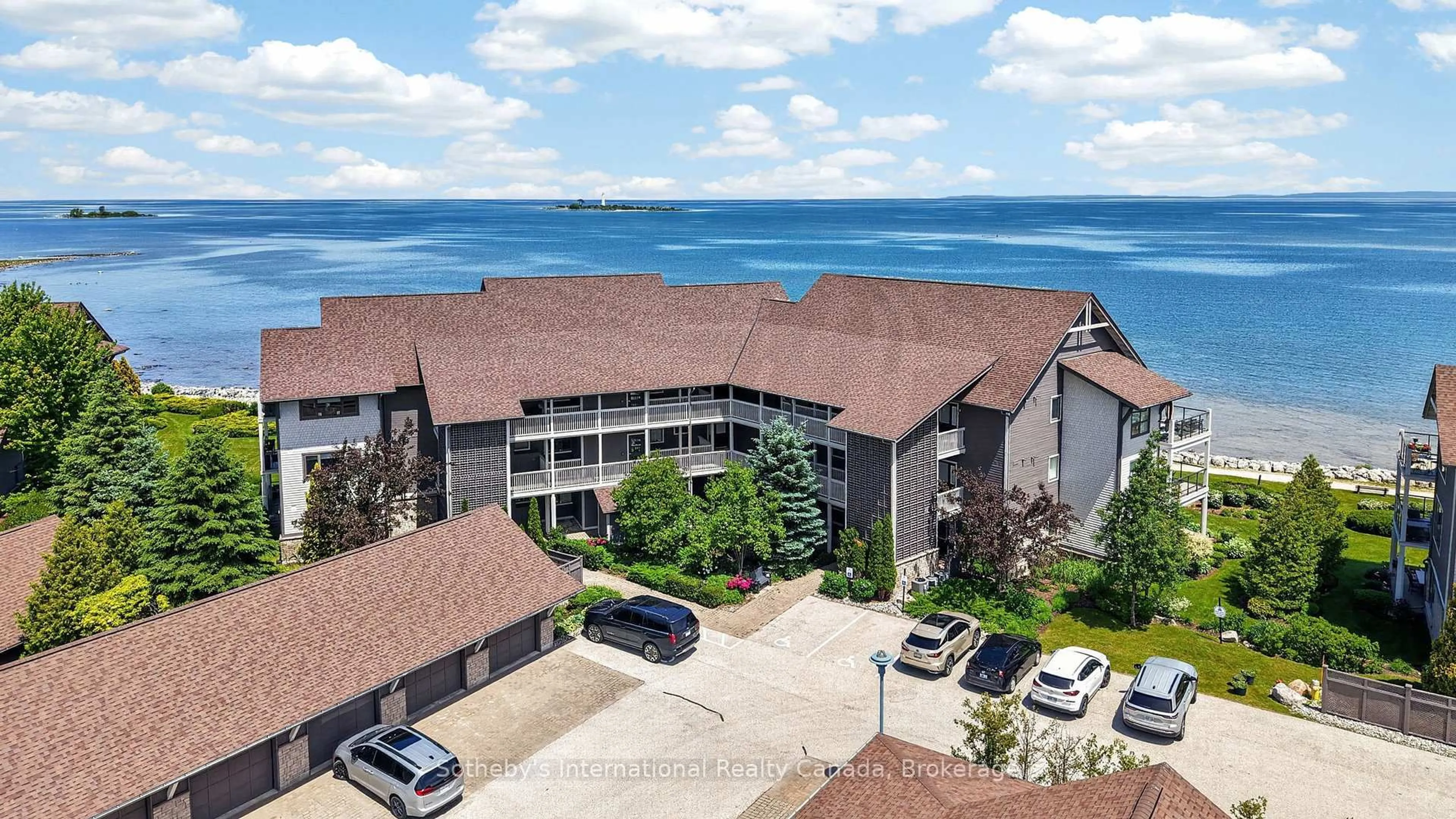 A pic from outside/outdoor area/front of a property/back of a property/a pic from drone, water/lake/river/ocean view for 555 Mariners Way, Collingwood Ontario L9Y 5C7