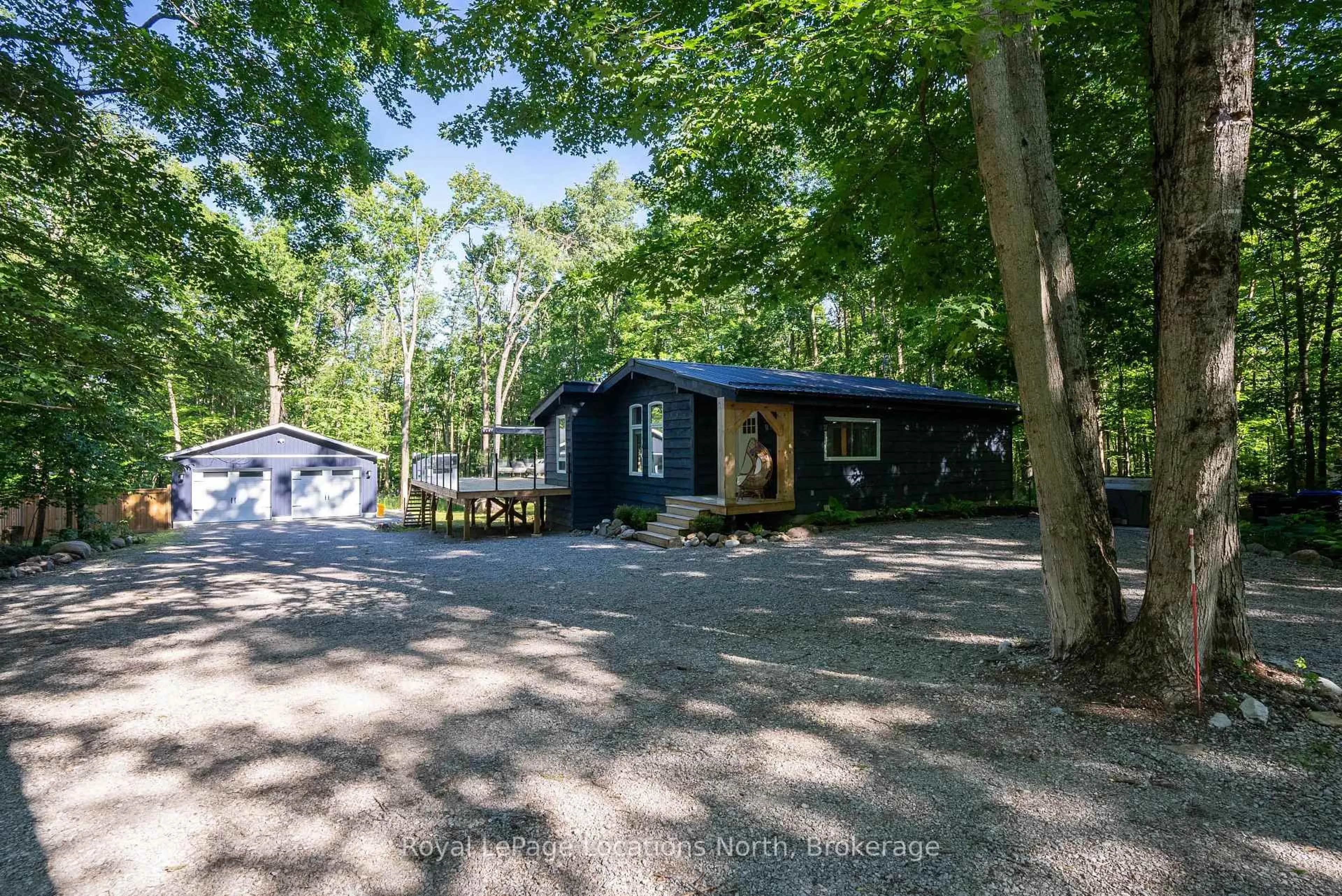 A pic from outside/outdoor area/front of a property/back of a property/a pic from drone, forest/trees view for 74 Slalom Dr, Oro-Medonte Ontario L0K 1N0