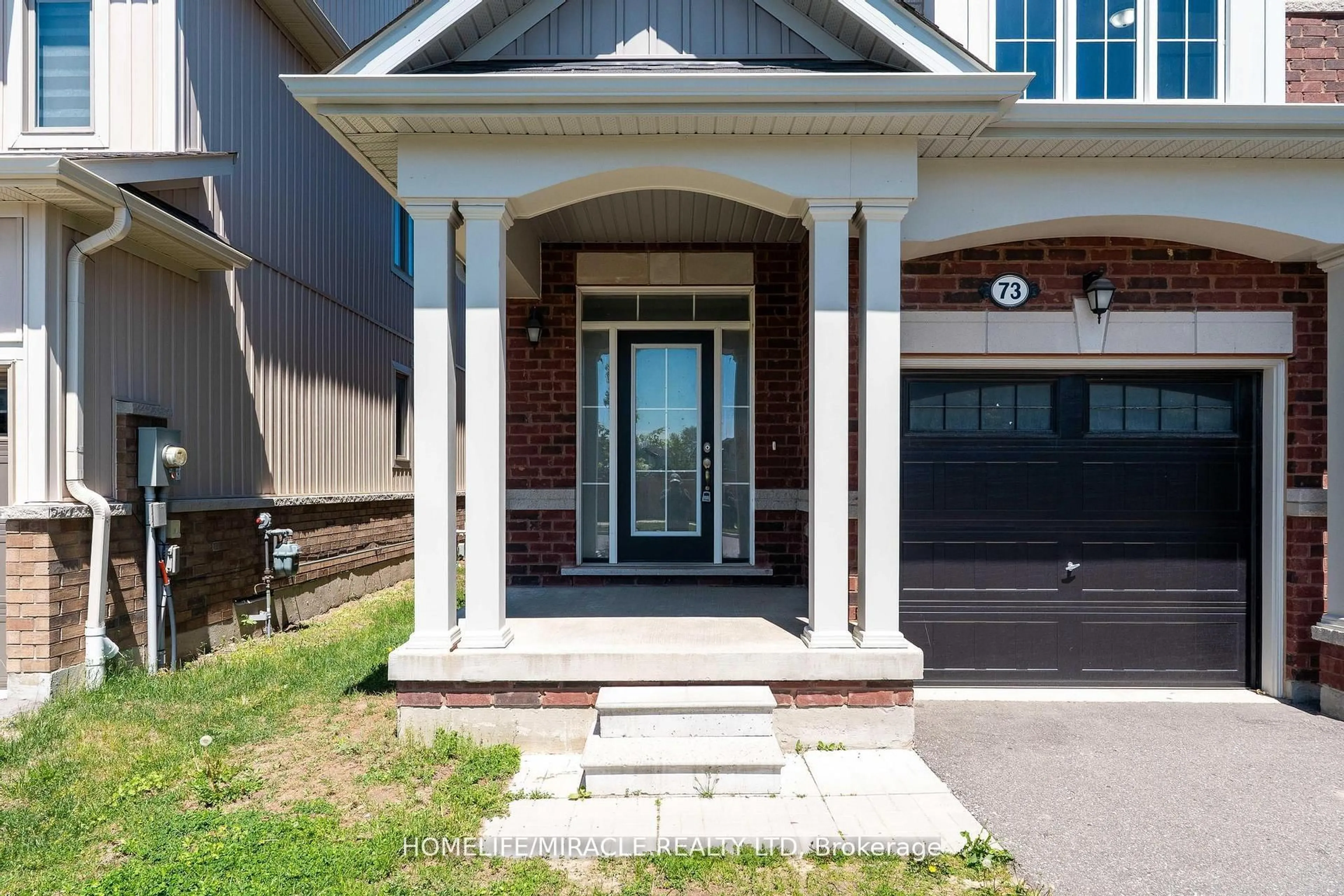Home with brick exterior material, street for 73 Tracey Lane, Collingwood Ontario L9Y 3V2
