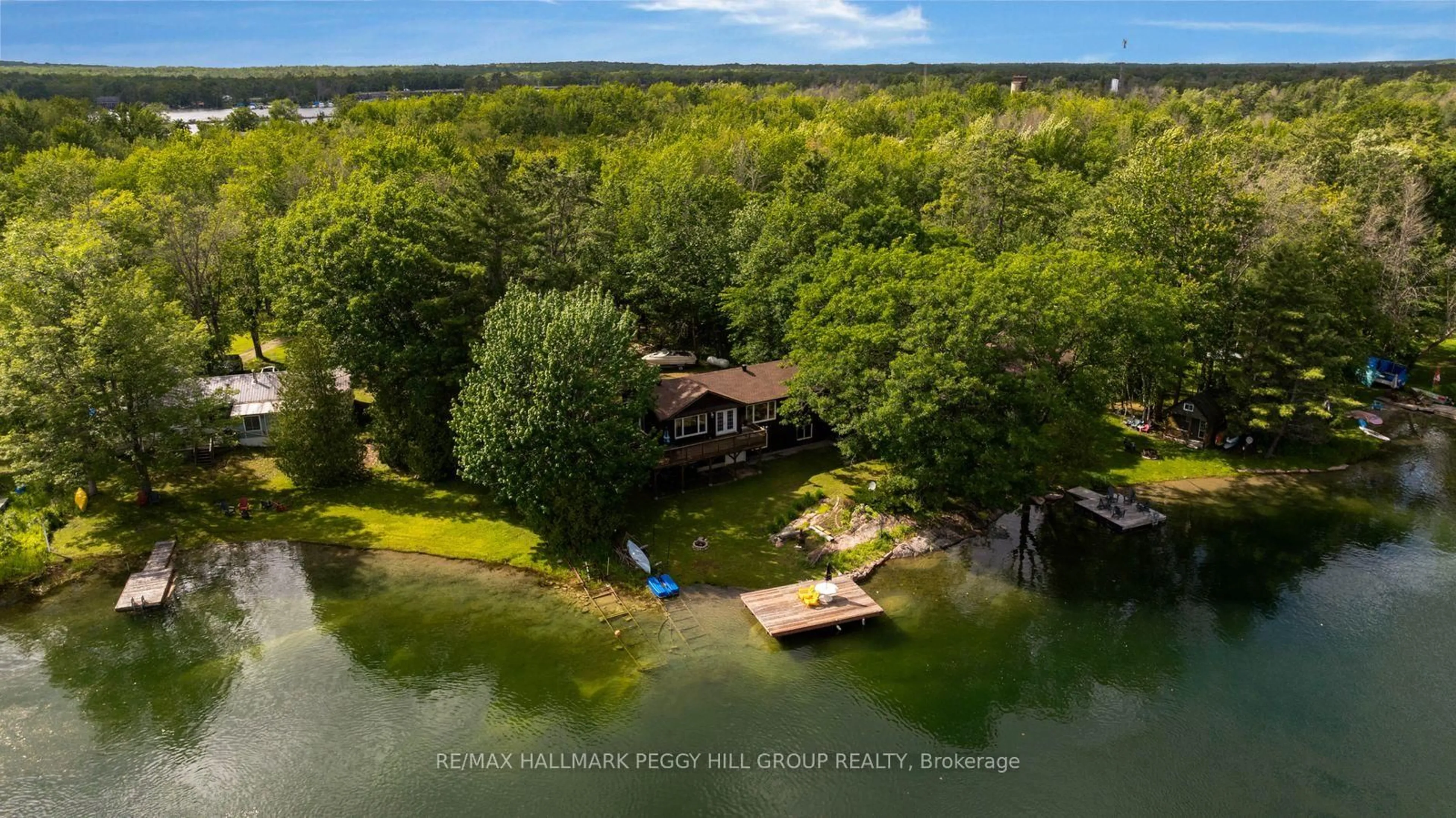 A pic from outside/outdoor area/front of a property/back of a property/a pic from drone, water/lake/river/ocean view for 7661 Somerset Park, Ramara Ontario L0K 2B0