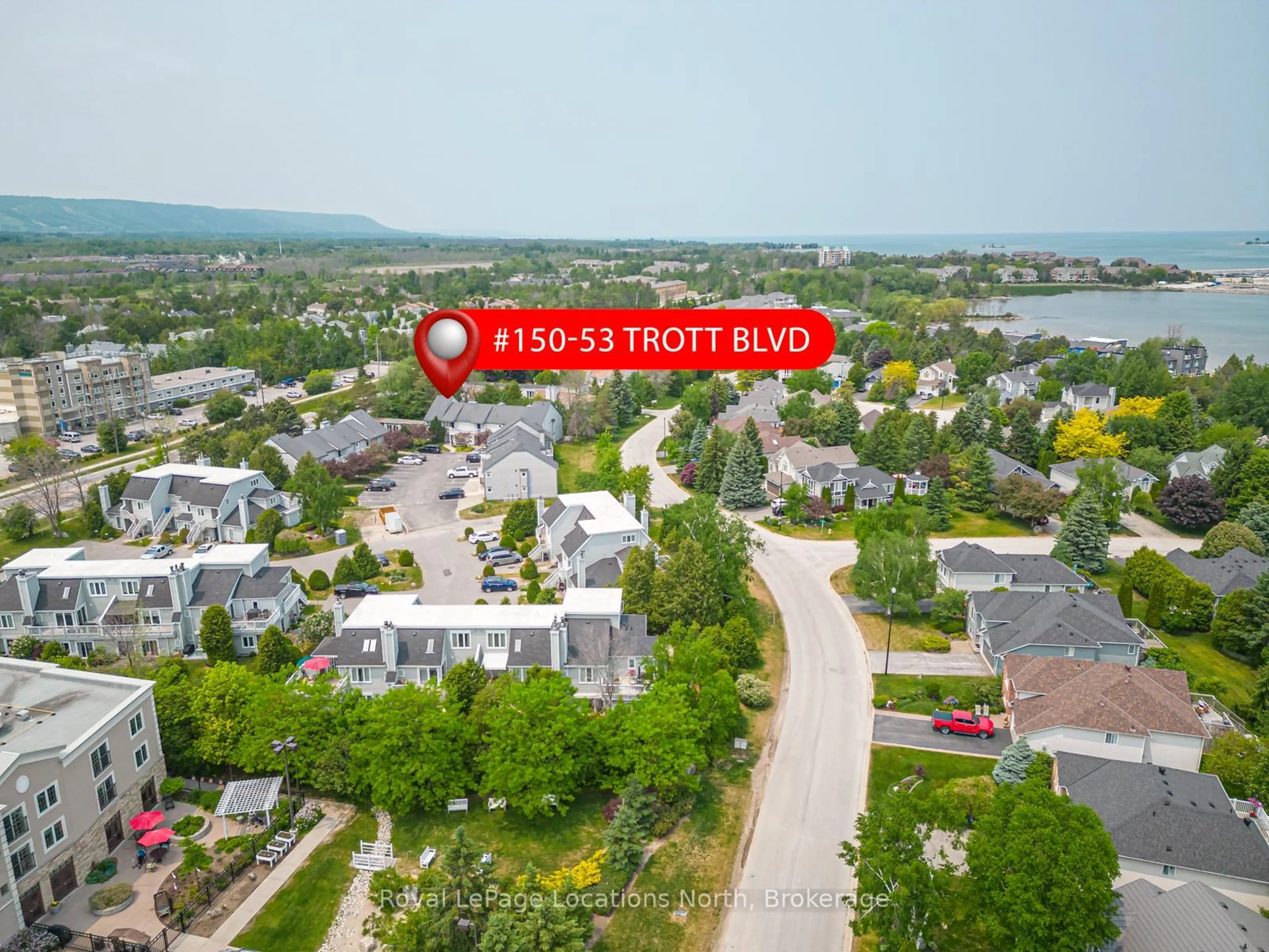A pic from outside/outdoor area/front of a property/back of a property/a pic from drone, street for 53 Trott Blvd #150, Collingwood Ontario L9Y 5B8