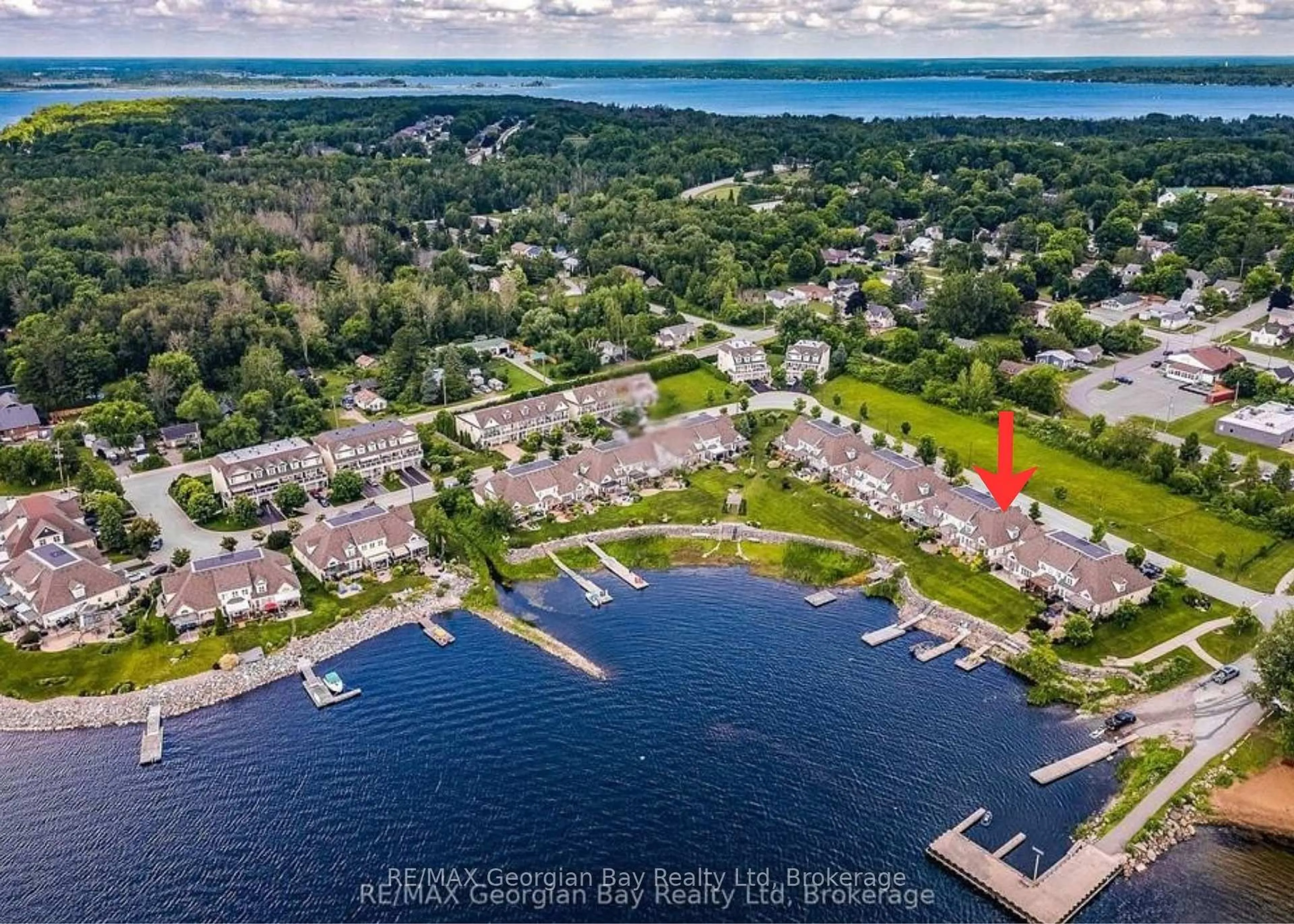 A pic from outside/outdoor area/front of a property/back of a property/a pic from drone, water/lake/river/ocean view for 210 Wycliffe Cove, Tay Ontario L0K 2A0