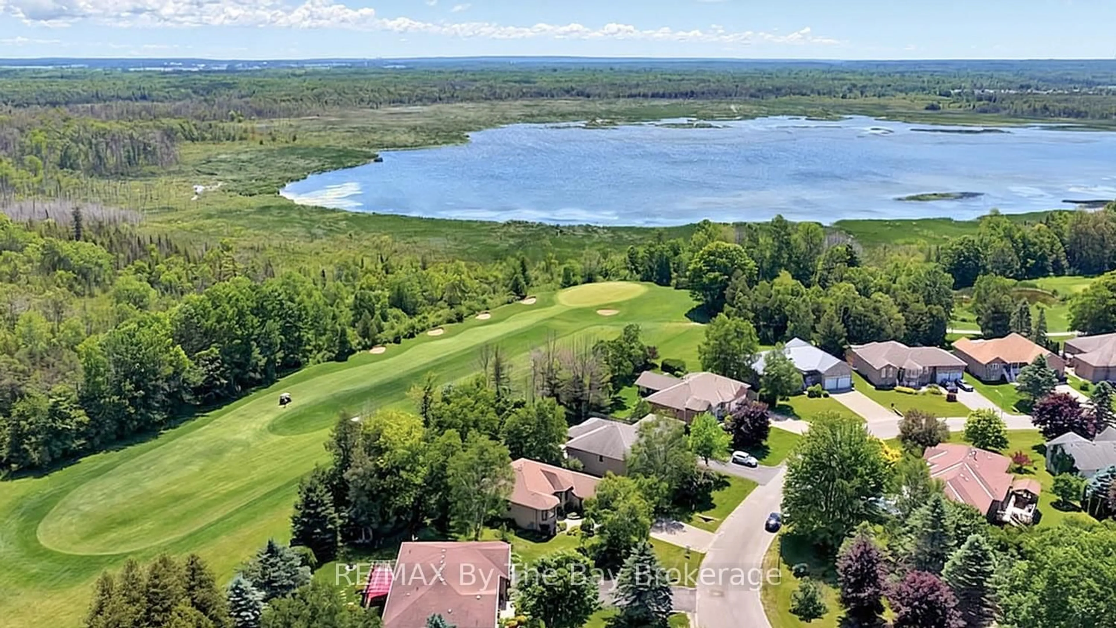 A pic from outside/outdoor area/front of a property/back of a property/a pic from drone, water/lake/river/ocean view for 54 Fairway Cres, Wasaga Beach Ontario L9Z 1B8