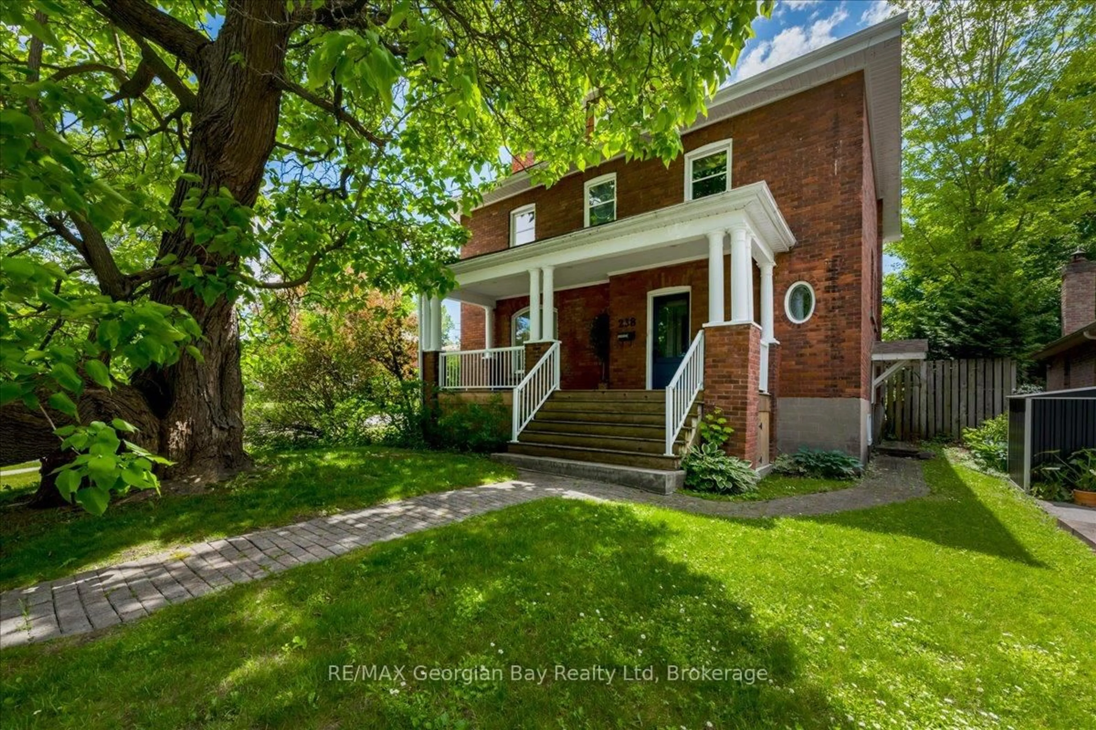 Home with brick exterior material, street for 238 Sixth St, Midland Ontario L4R 3Y1