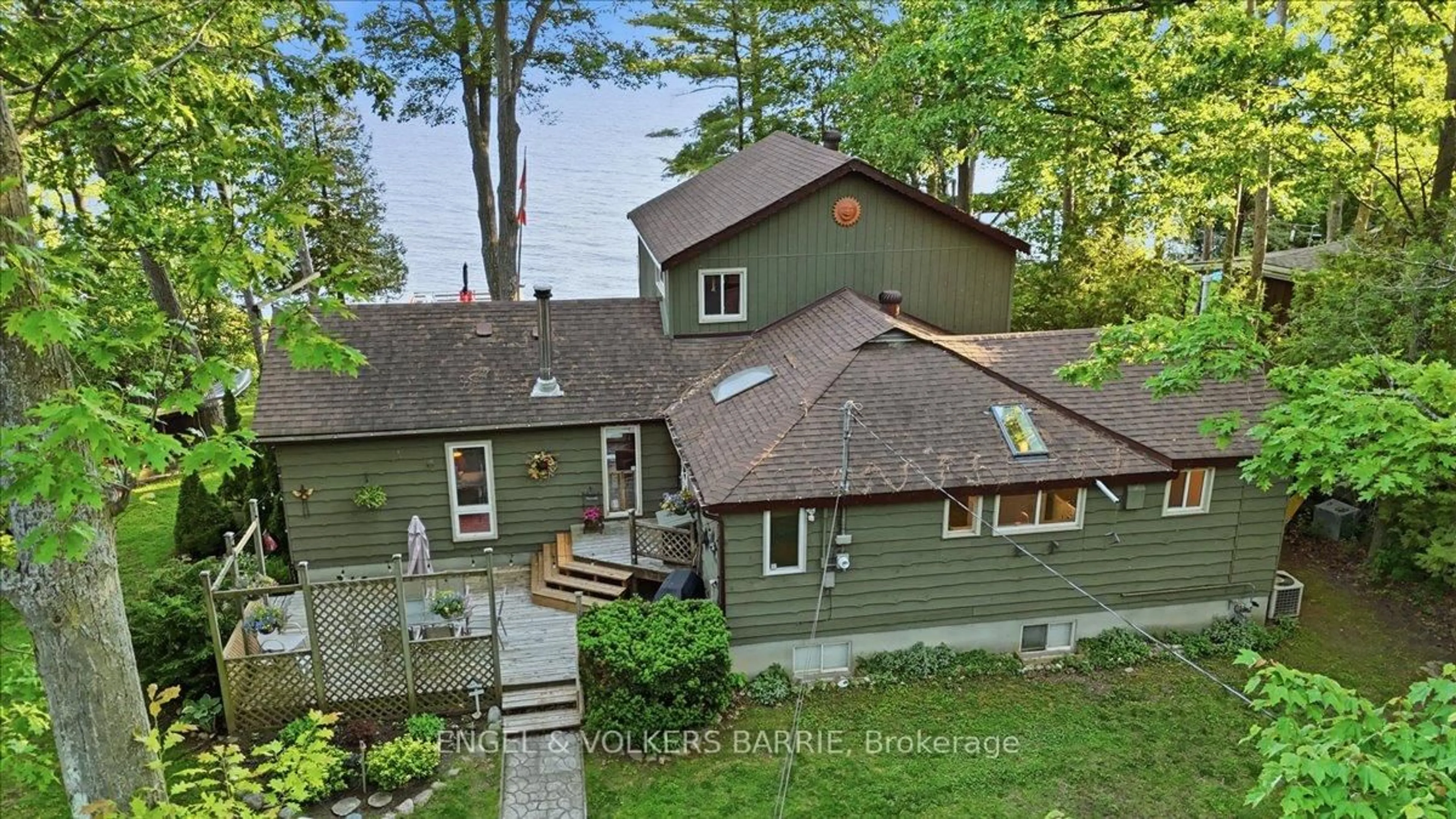 A pic from outside/outdoor area/front of a property/back of a property/a pic from drone, street for 1784 Tiny Beaches Rd, Tiny Ontario L0L 2J0