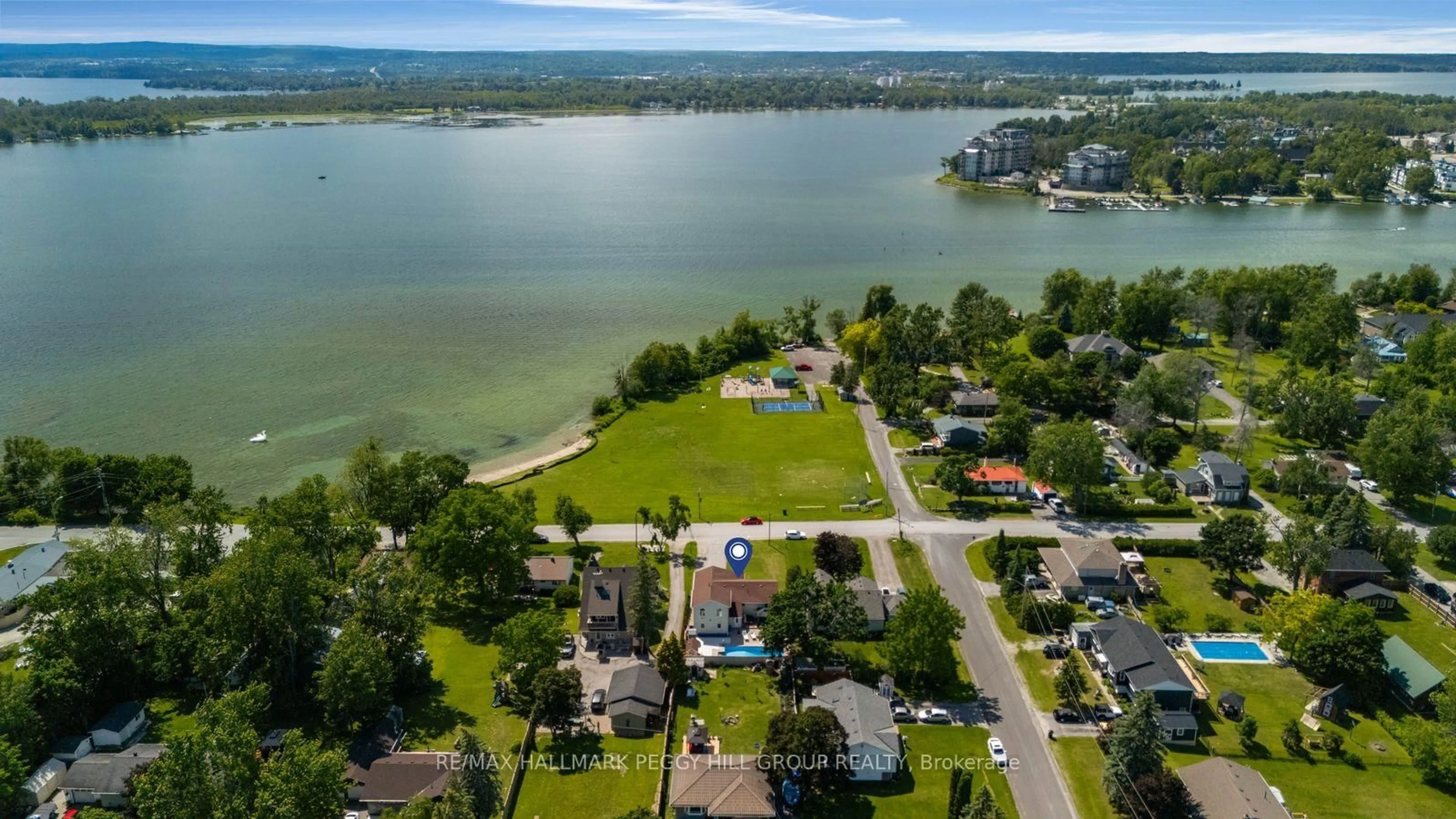 A pic from outside/outdoor area/front of a property/back of a property/a pic from drone, water/lake/river/ocean view for 72 Creighton St, Ramara Ontario L3V 1B2