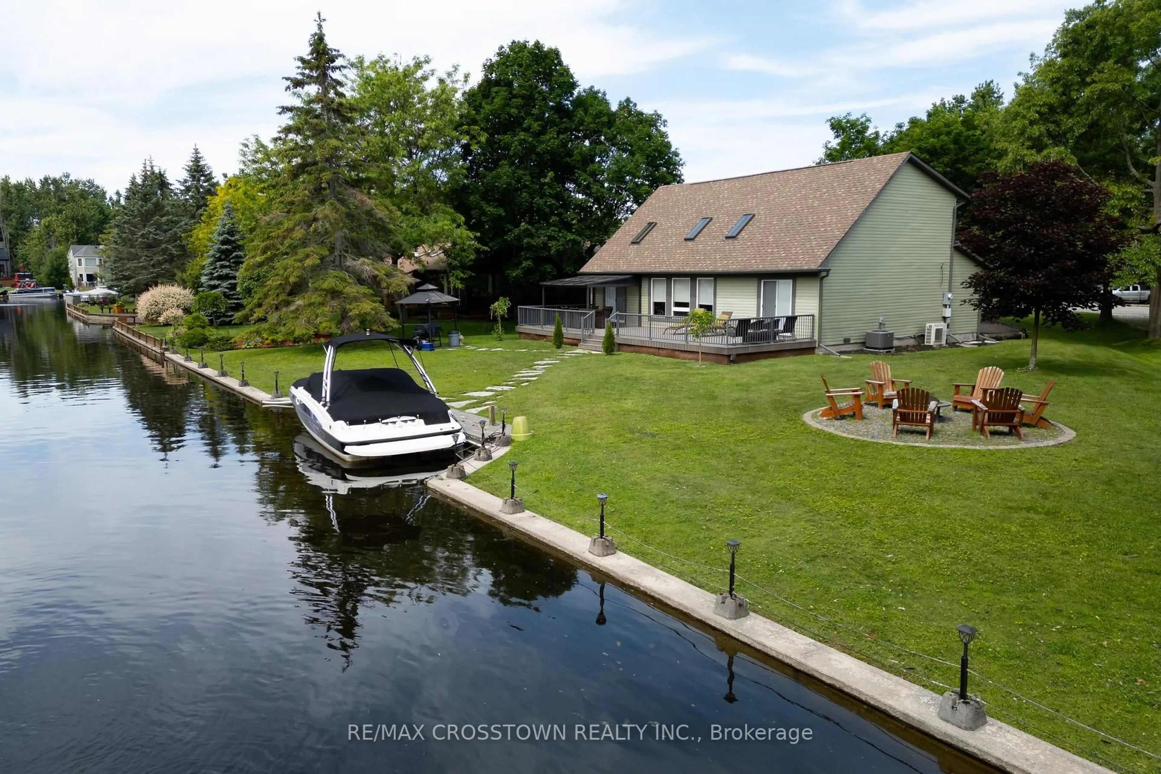 A pic from outside/outdoor area/front of a property/back of a property/a pic from drone, water/lake/river/ocean view for 21 Beaver Tr, Ramara Ontario L0K 1B0