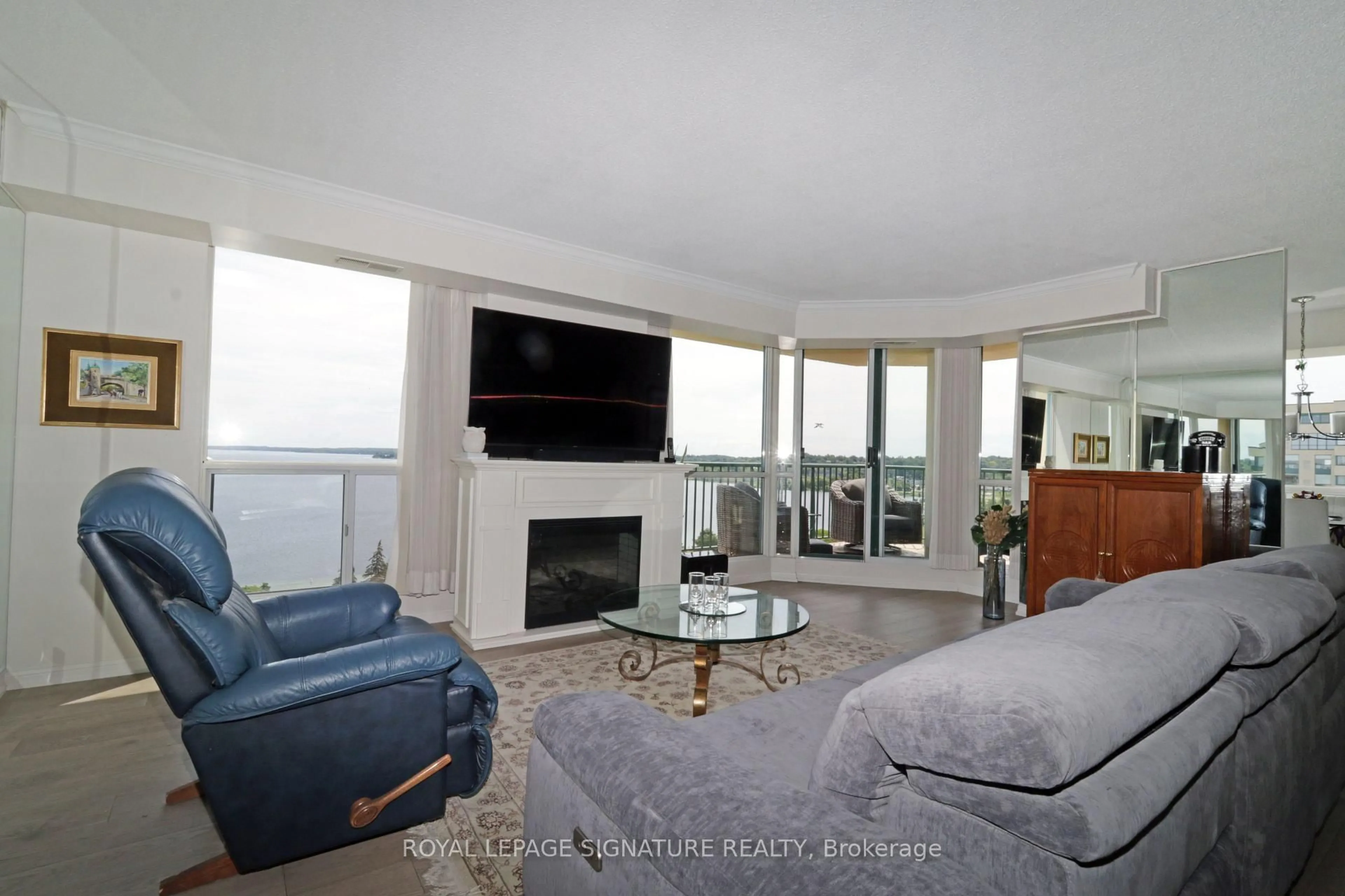Living room with furniture, unknown for 65 Ellen St #1004, Barrie Ontario L4N 3A5