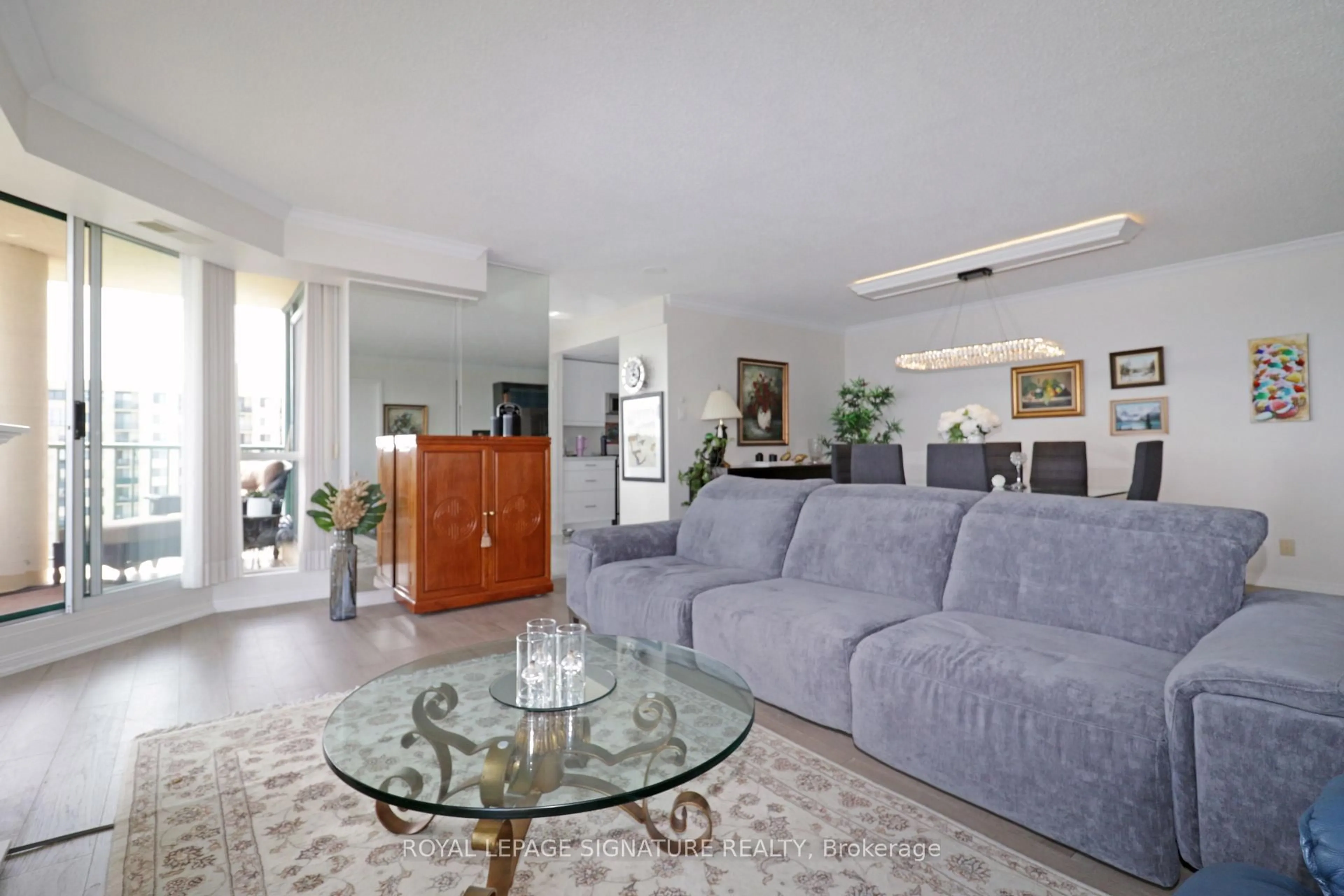 Living room with furniture, unknown for 65 Ellen St #1004, Barrie Ontario L4N 3A5