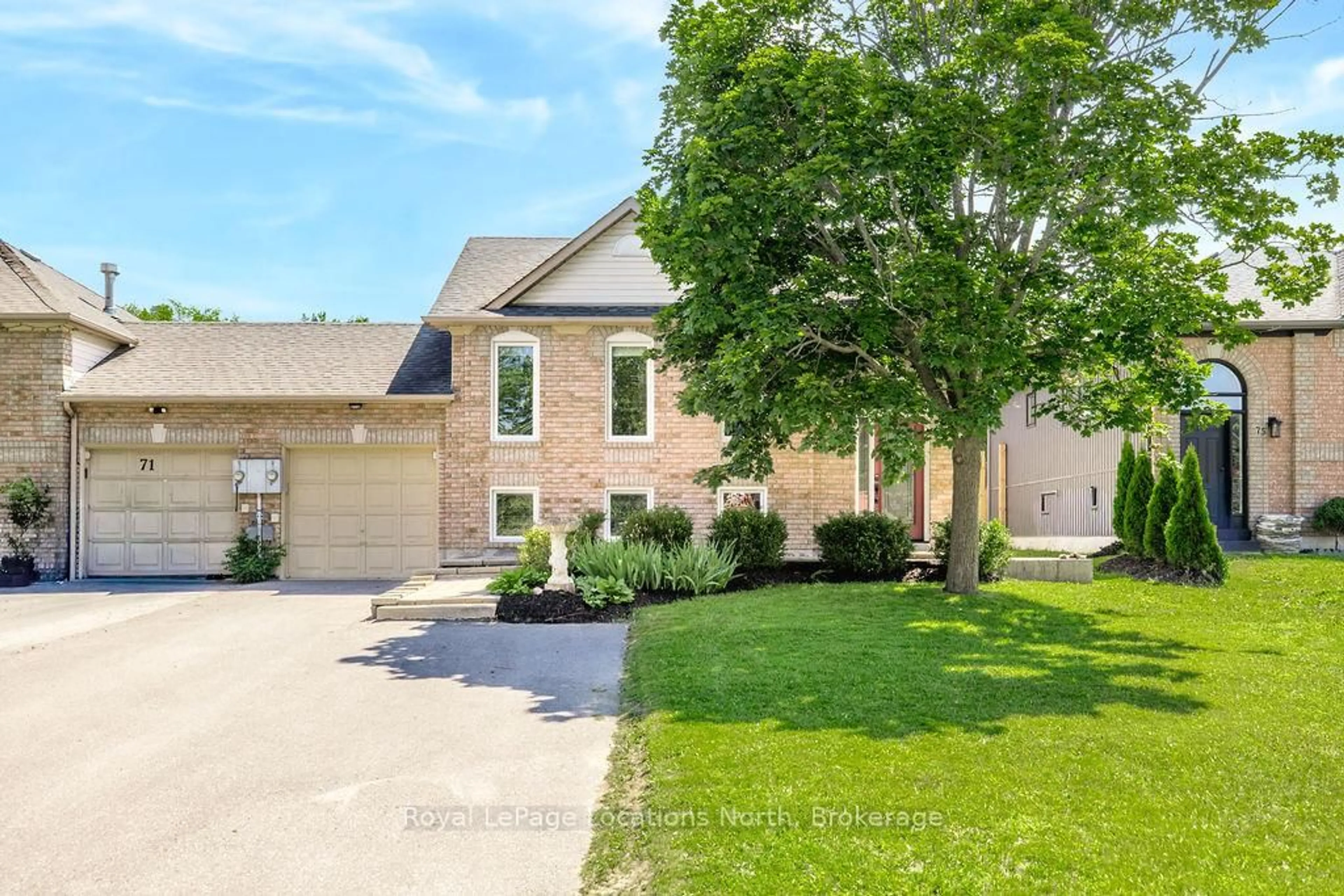 Home with brick exterior material, street for 73 Fernbrook Dr, Wasaga Beach Ontario L9Z 1G5