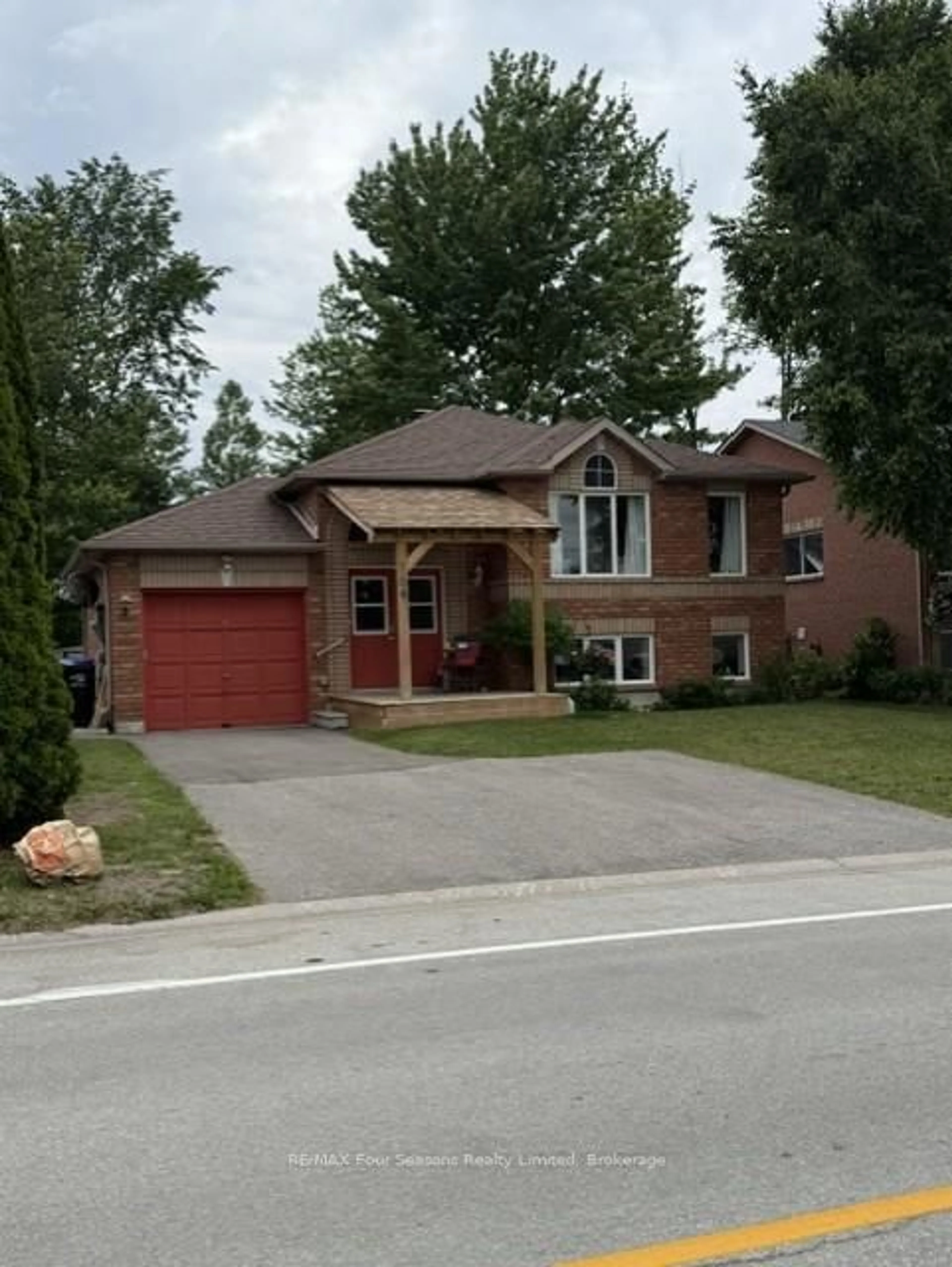 Home with brick exterior material, street for 164 58th St, Wasaga Beach Ontario L9Z 1N9