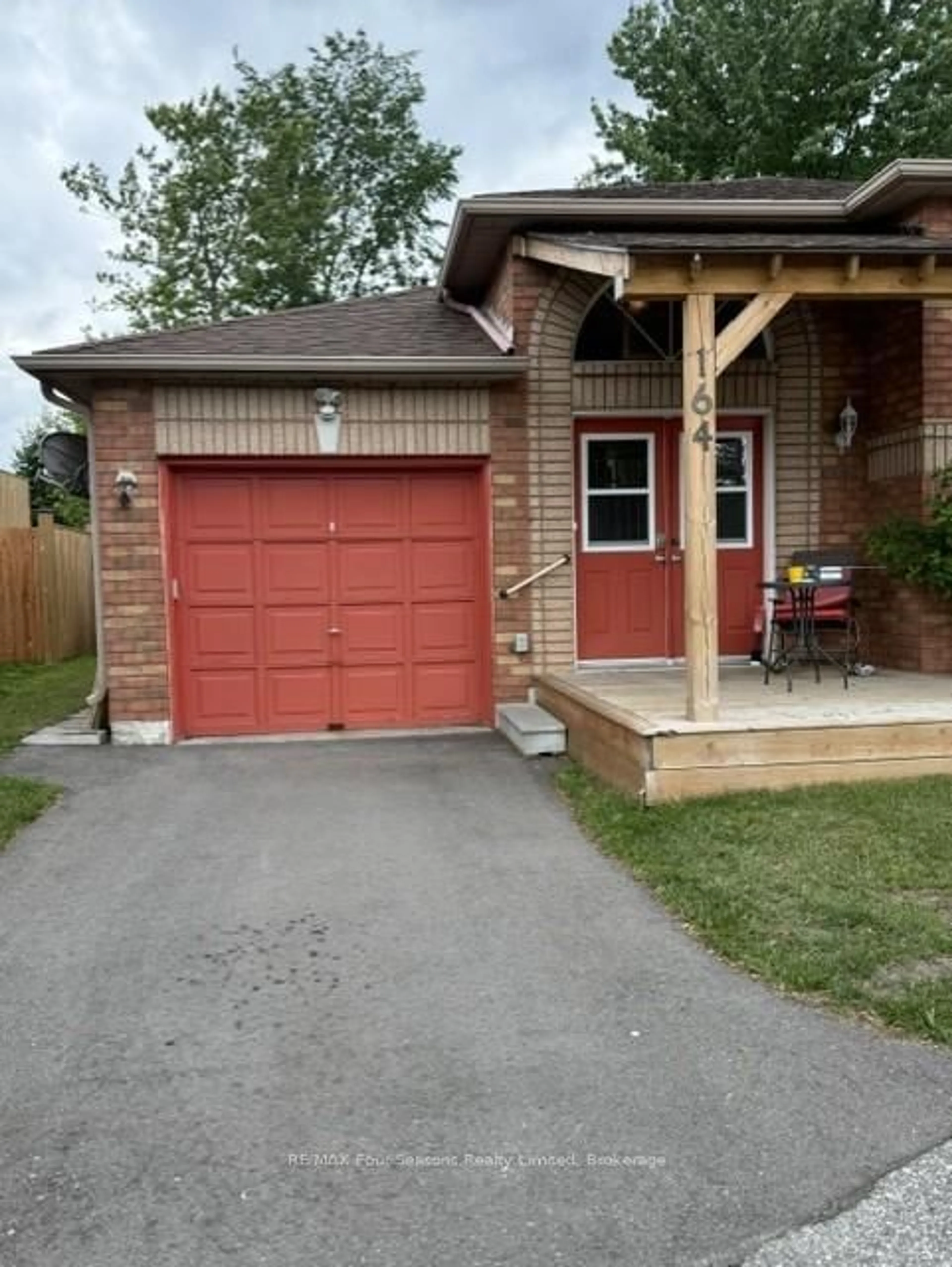 Home with brick exterior material, street for 164 58th St, Wasaga Beach Ontario L9Z 1N9