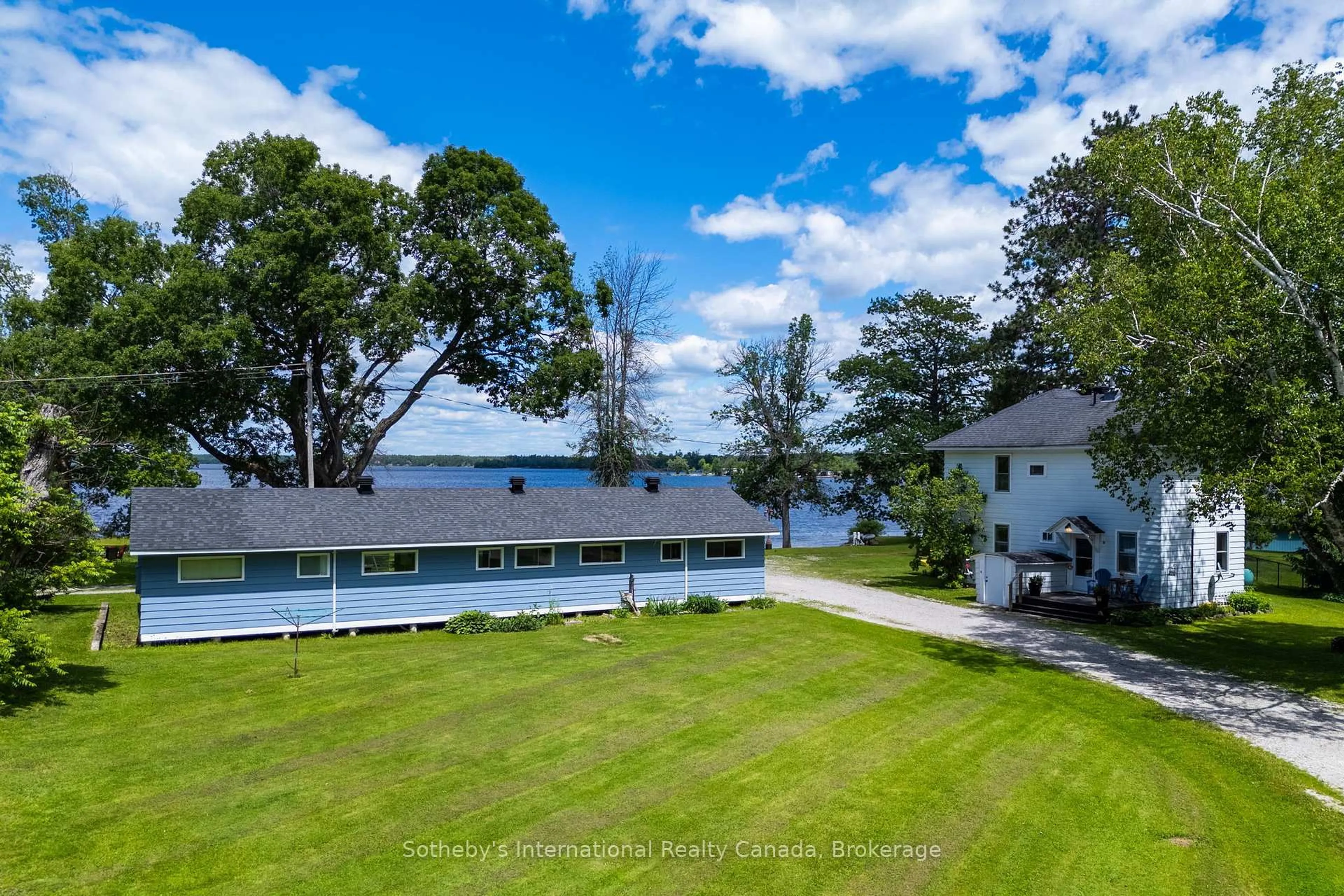 A pic from outside/outdoor area/front of a property/back of a property/a pic from drone, water/lake/river/ocean view for 1581 Port Stanton Pkwy, Severn Ontario P0E 1N0