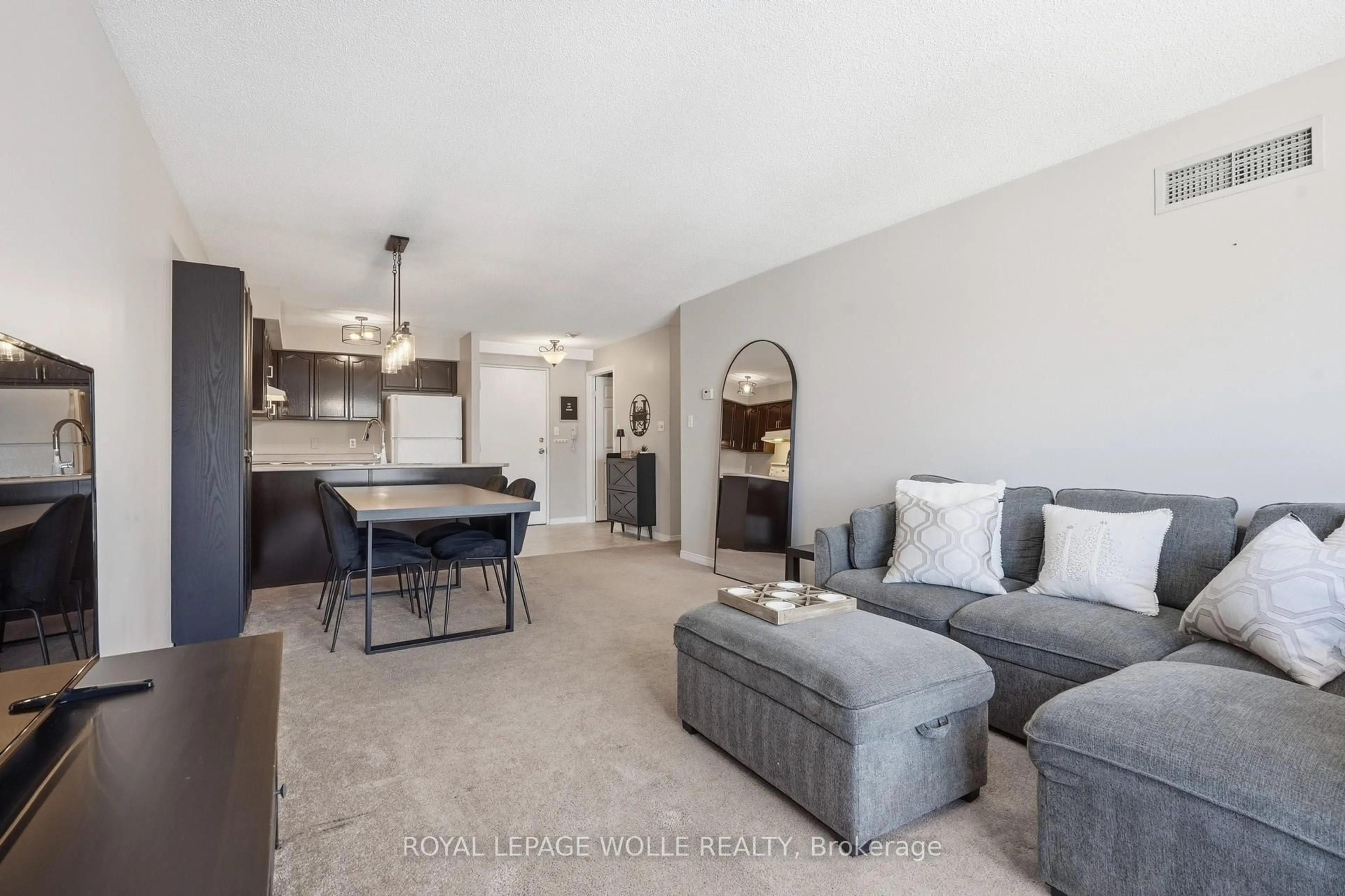 Living room with furniture, unknown for 107 Bond St #304, Orillia Ontario L3V 1J7